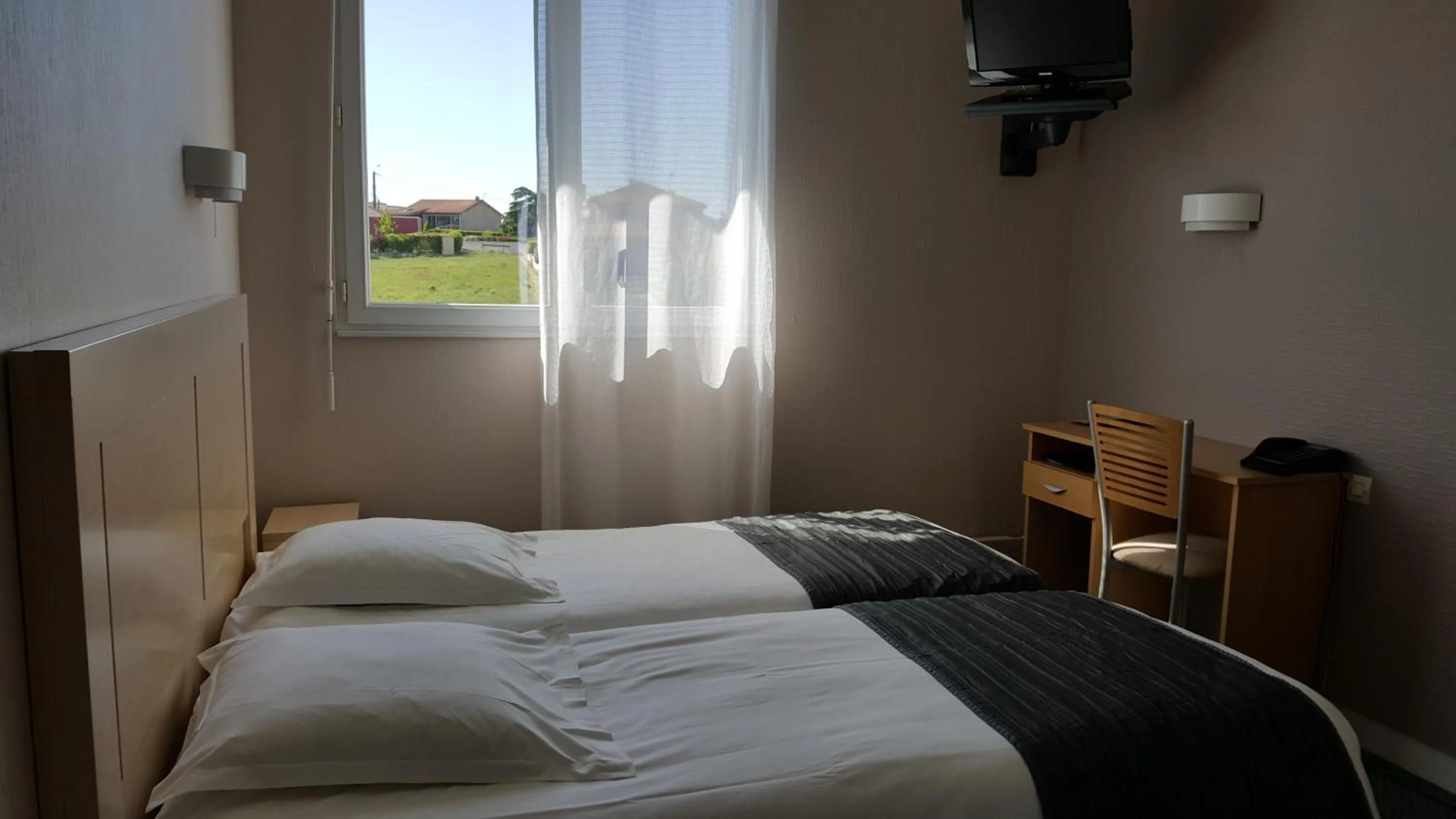 Bed in Hôtellerie Saint Jean