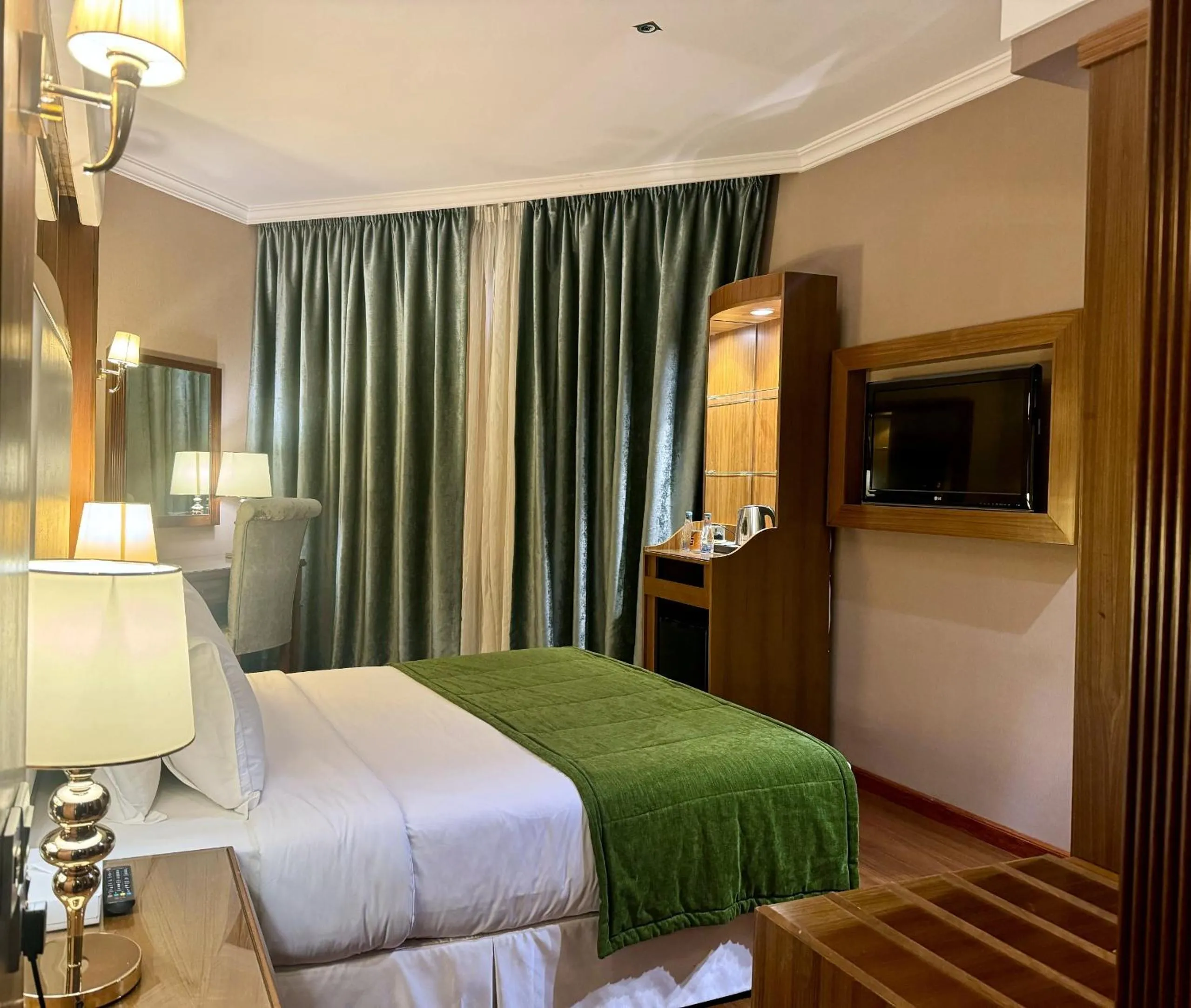 Bed in Jeddah Grand Hotel