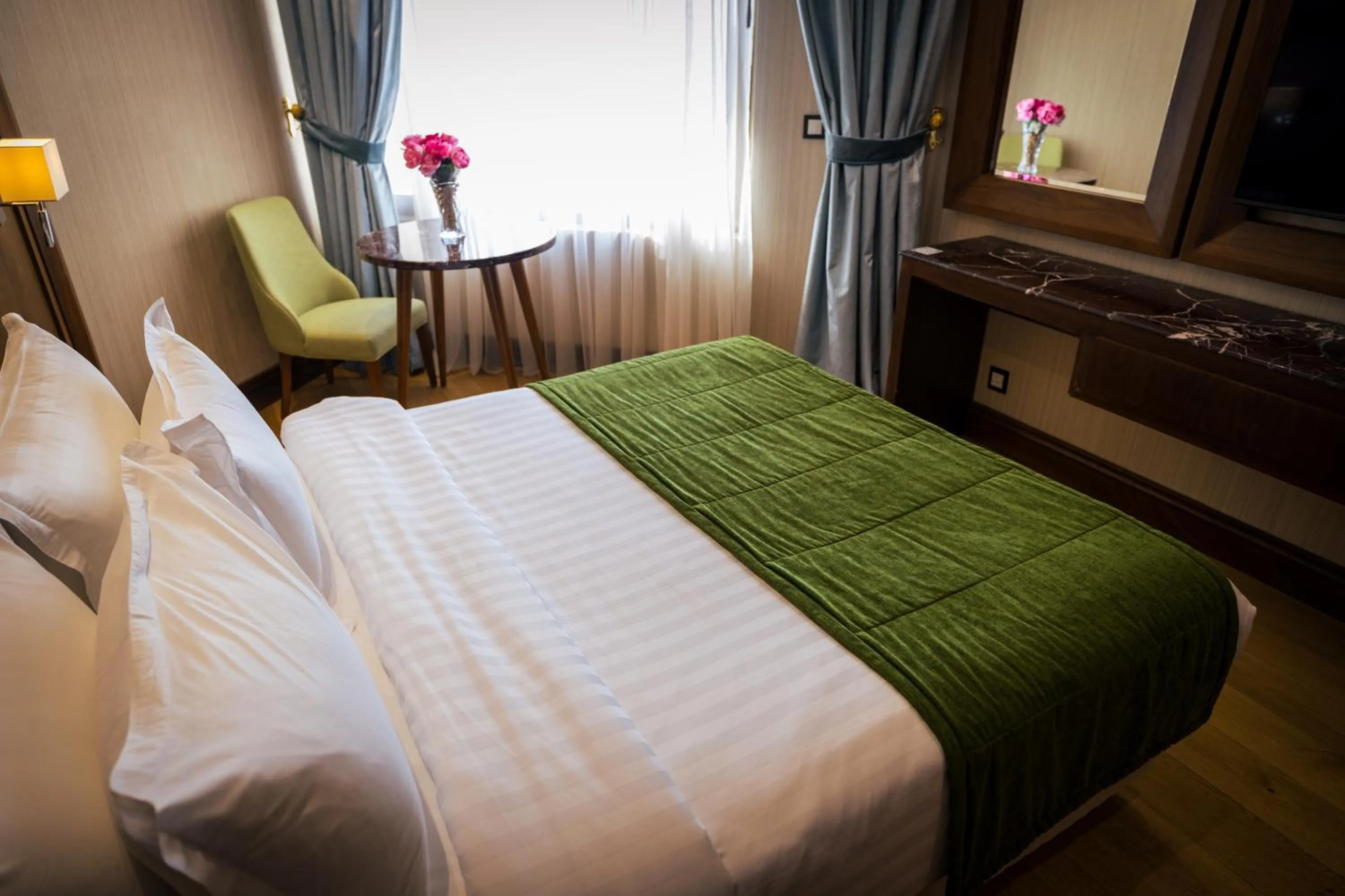 Bed in Jeddah Grand Hotel