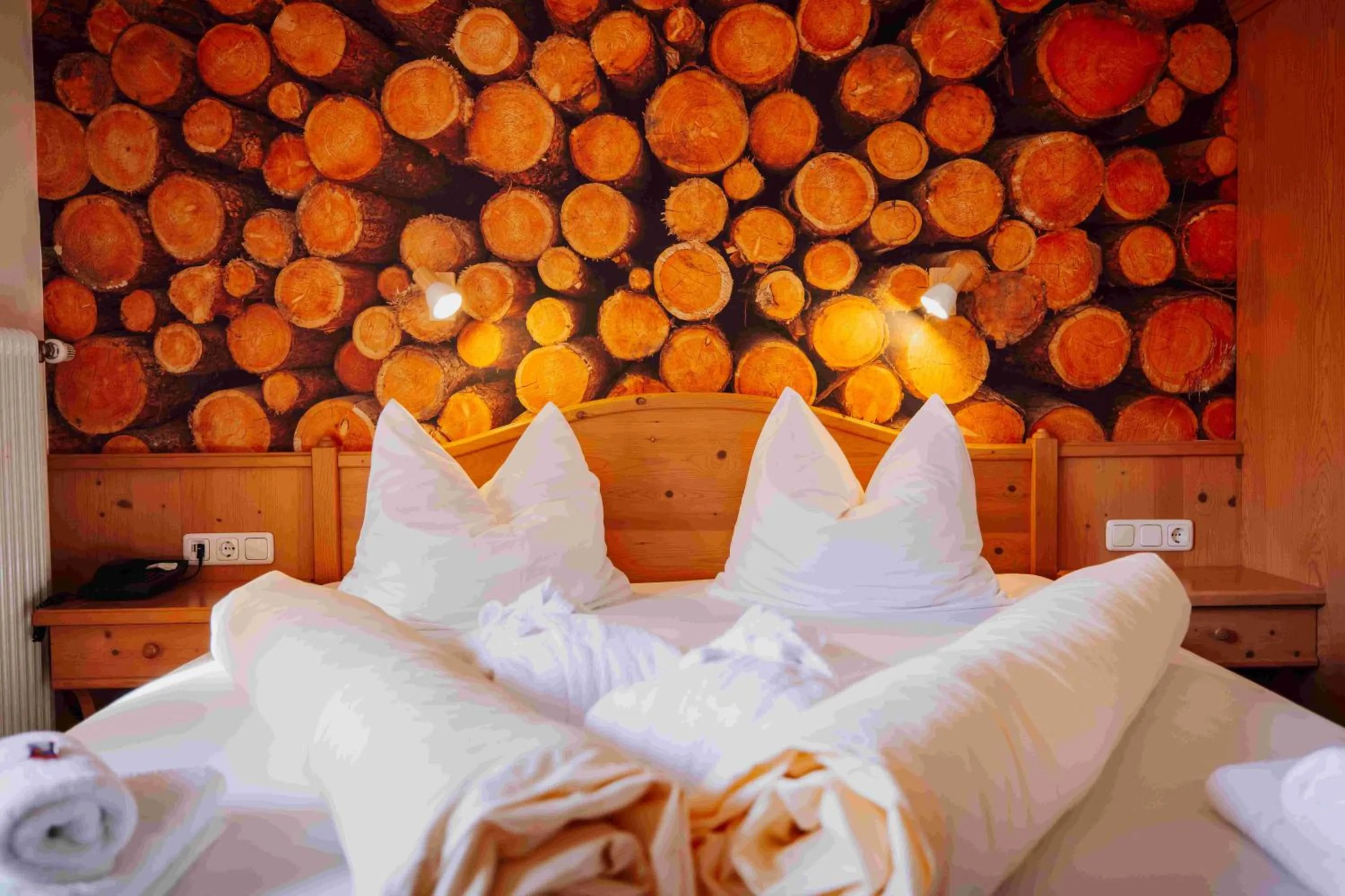 Bed in Hotel in the HEART of the Alps