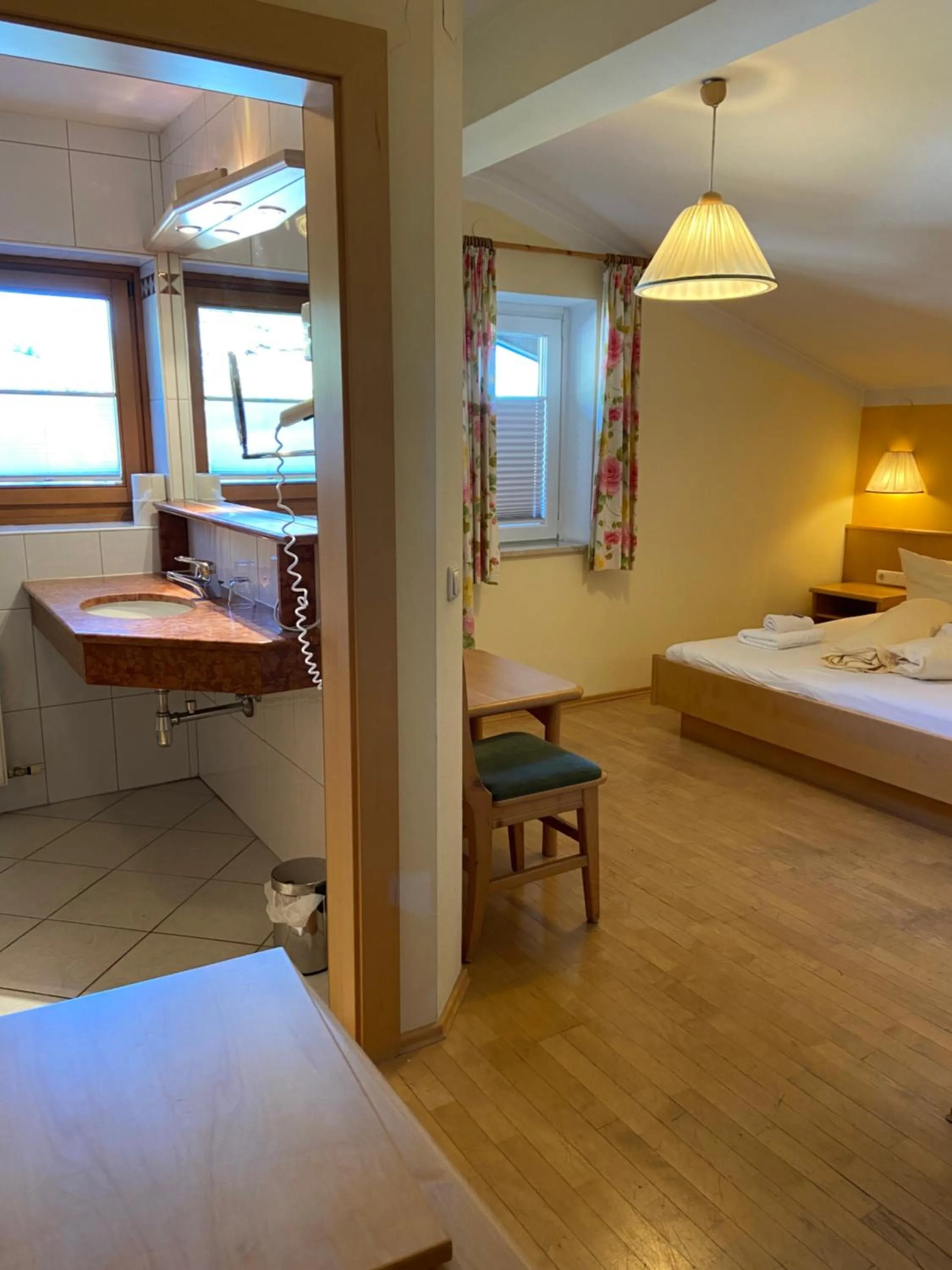 Bed in Hotel in the HEART of the Alps