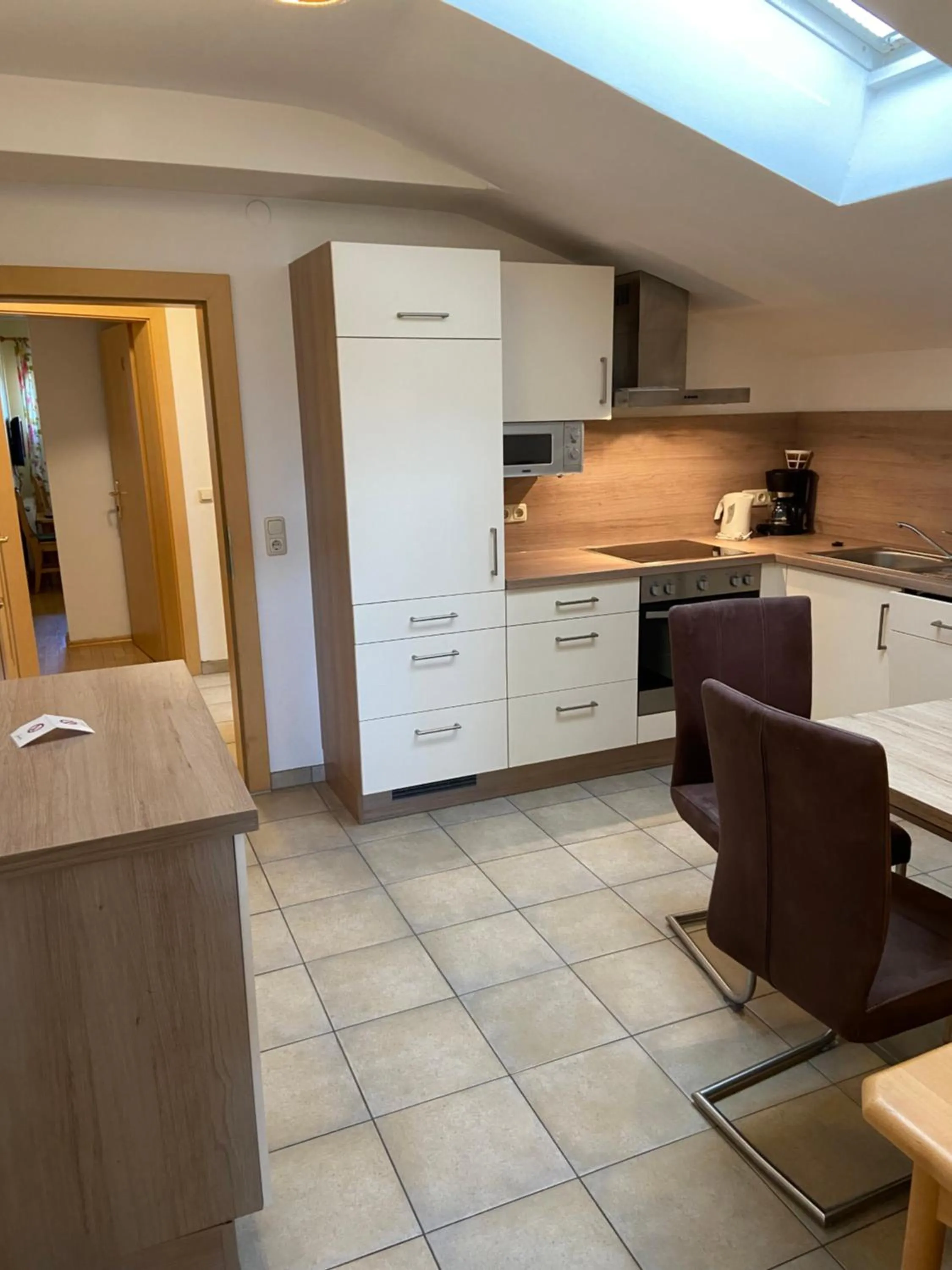 Kitchen or kitchenette in Hotel in the HEART of the Alps