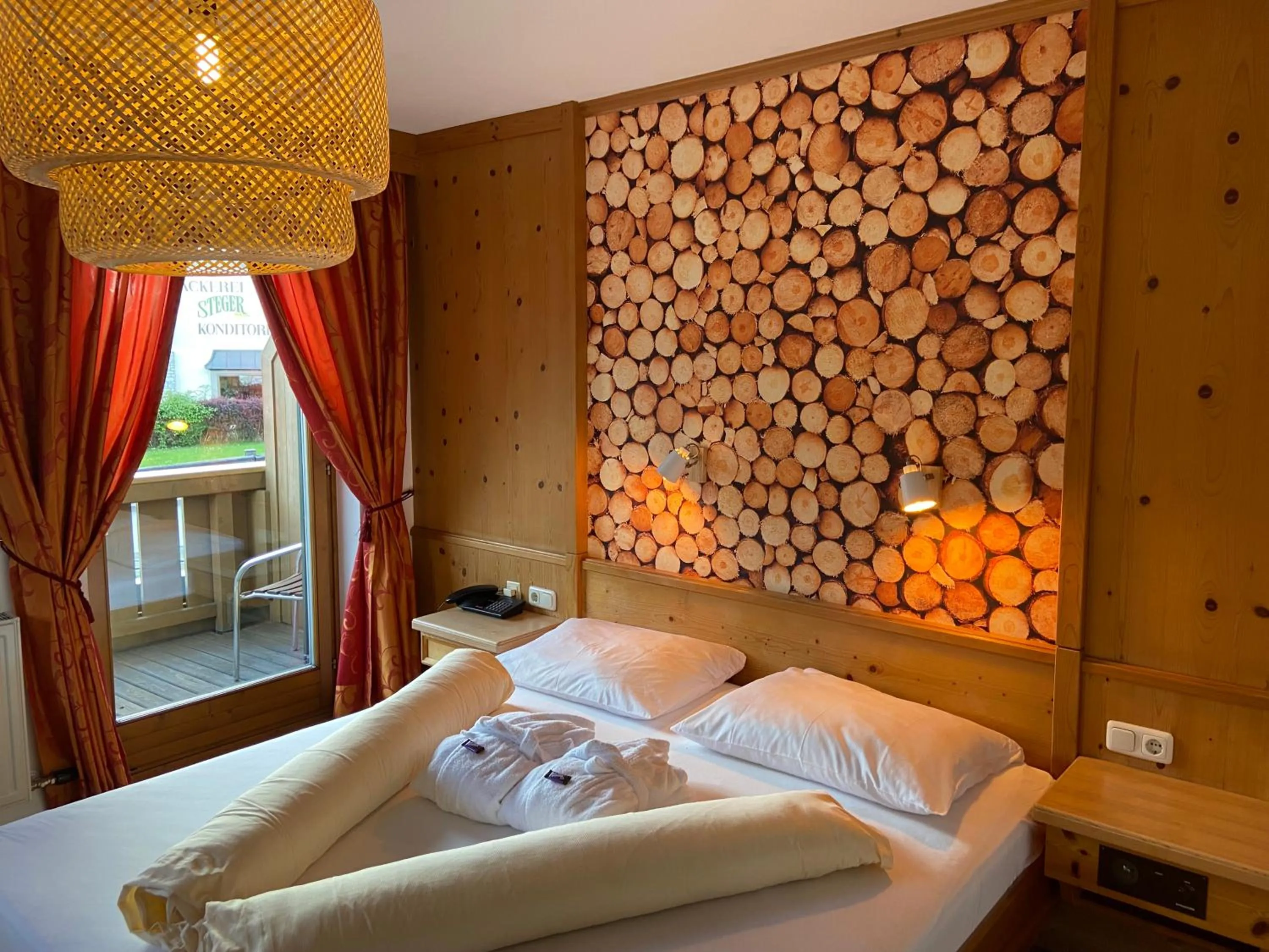 Bed in Hotel in the HEART of the Alps