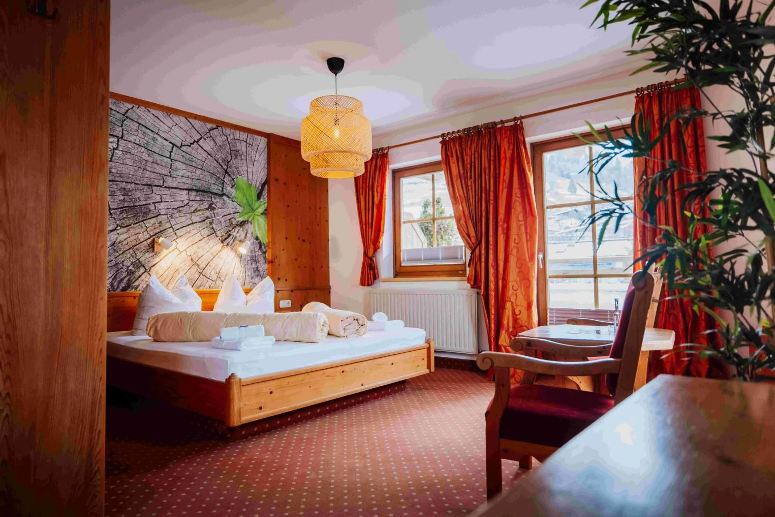 Bed in Hotel in the HEART of the Alps