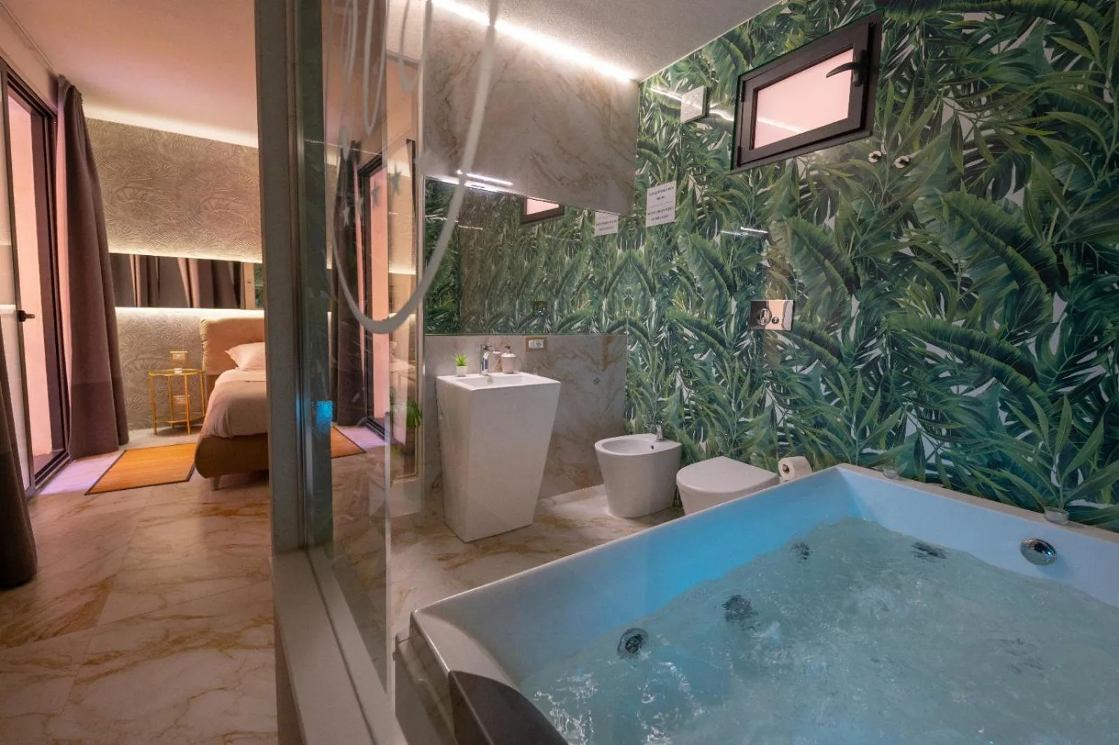 Bed in ETNEA 208 LUXURY JACUZZI SUITE Catania