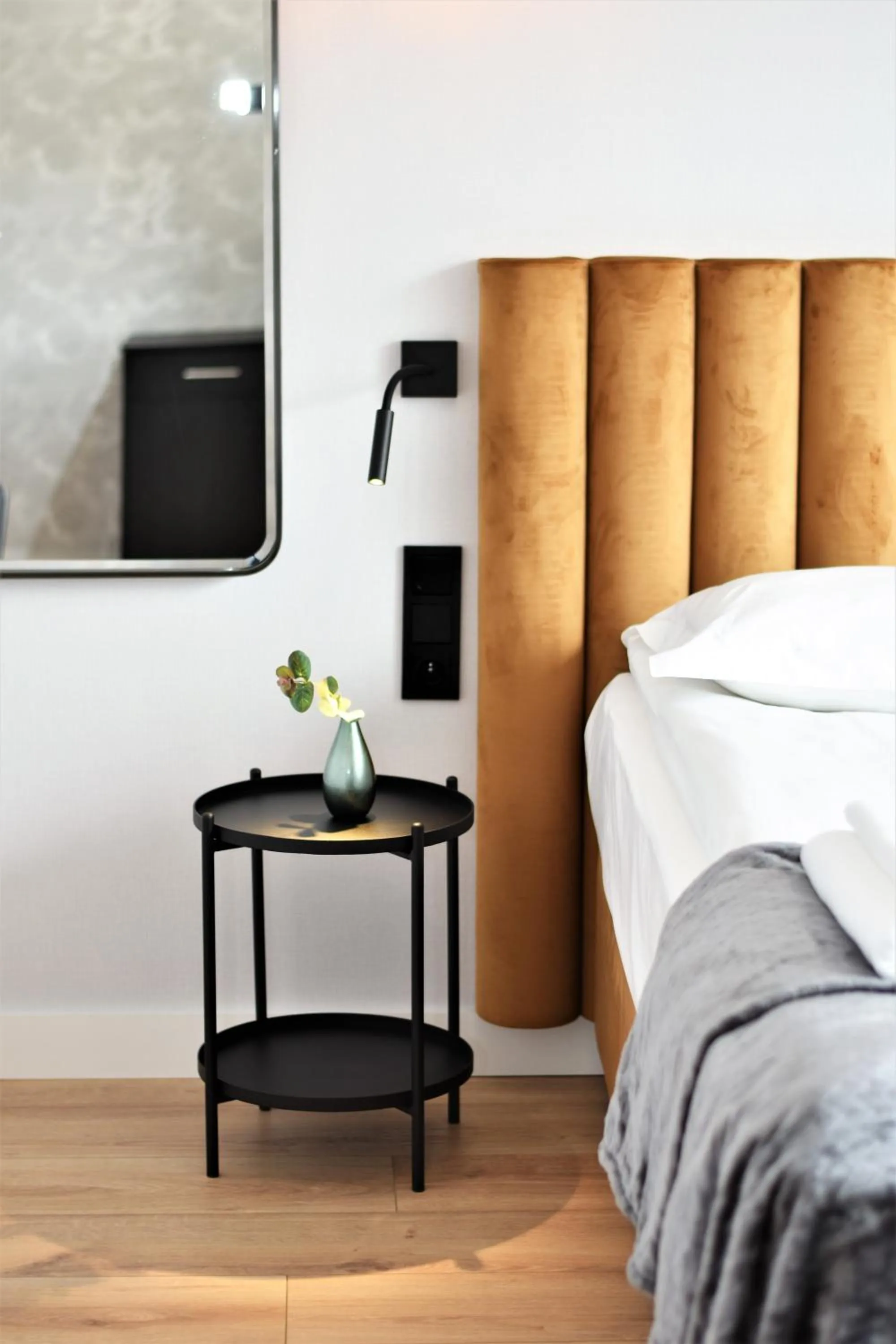 Bed in Patio Riverfront Aparthotel