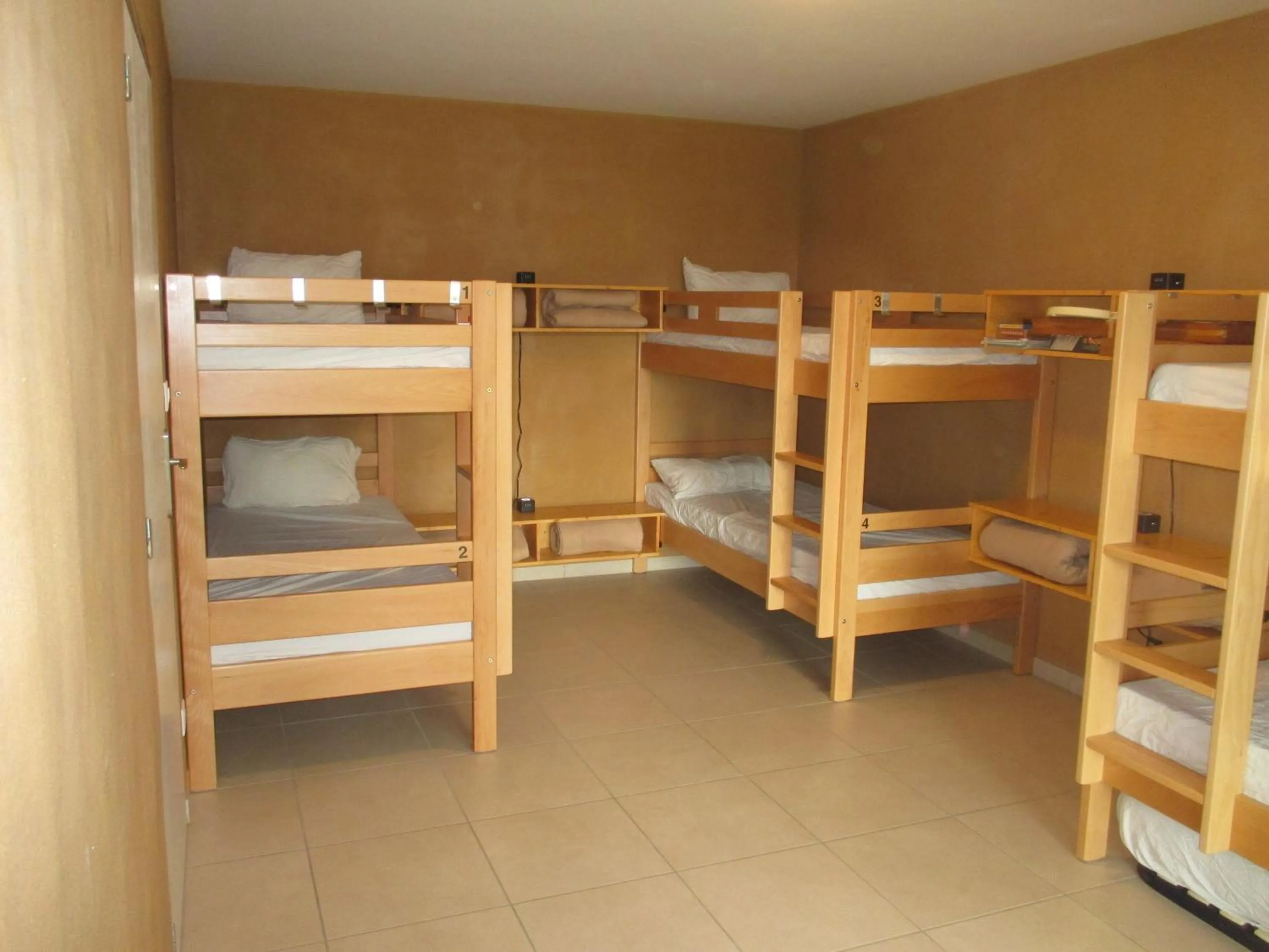 Bed in Le Baugyte - Gite de GROUPE - 14 lits simples