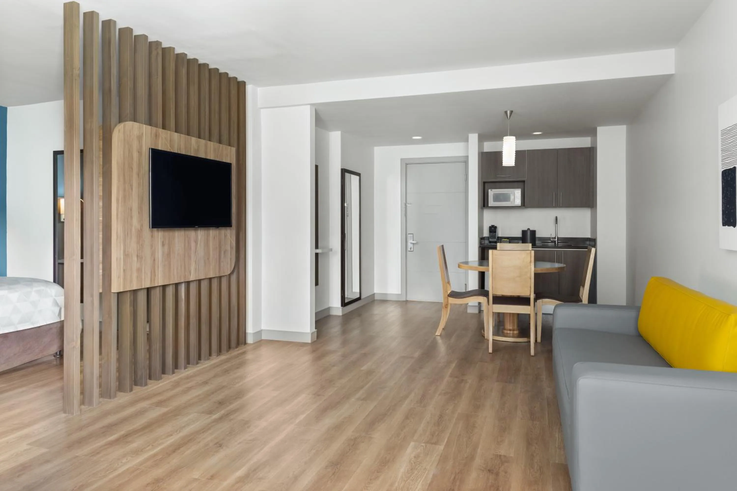 Living room, Bed in Holiday Inn Express San Jose Forum by IHG