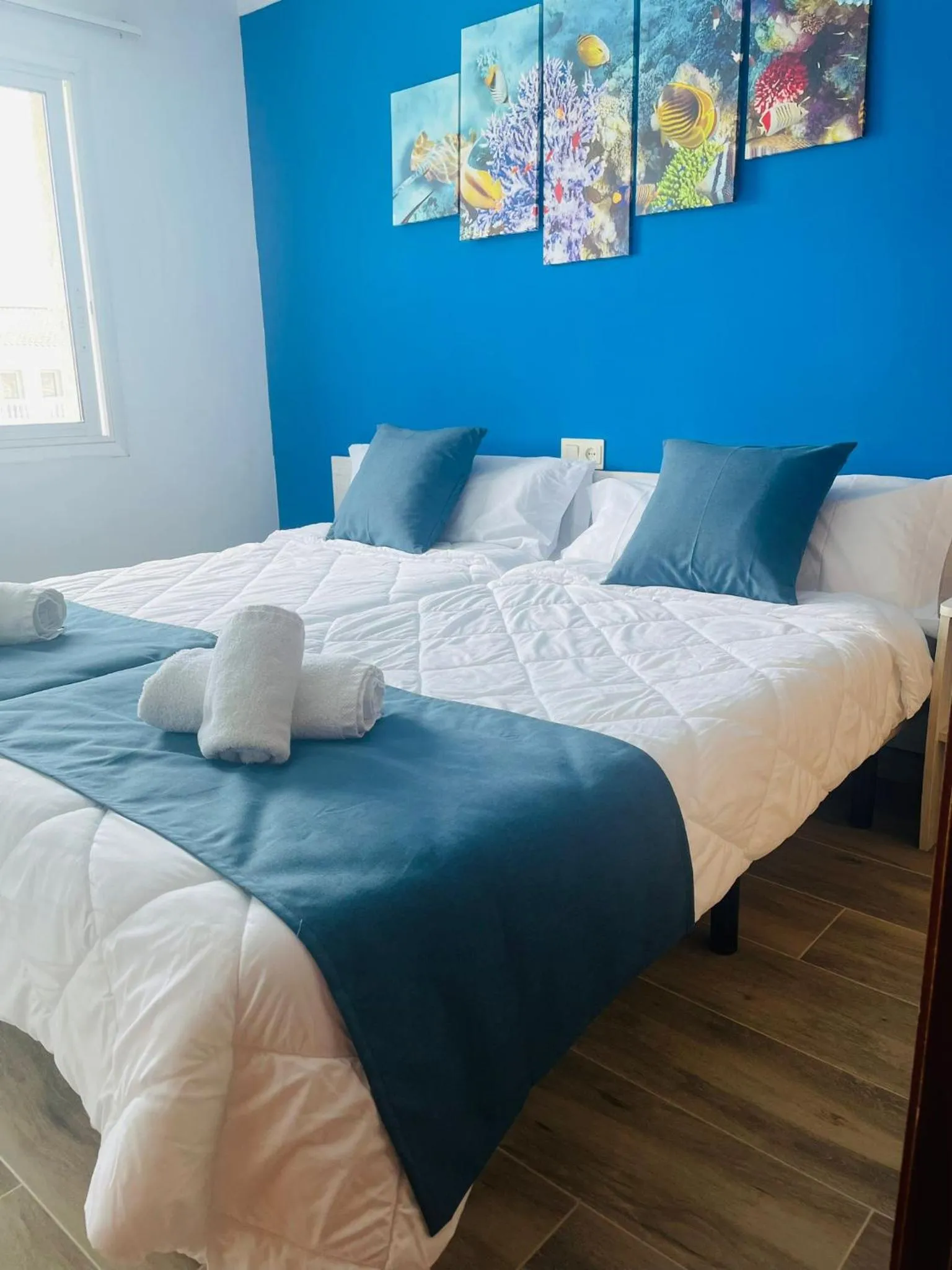 Bed in Europa Family Apartments