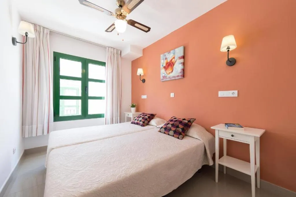 Bedroom, Bed in Billy's Puerto de Mogán Apartments by LIVVO