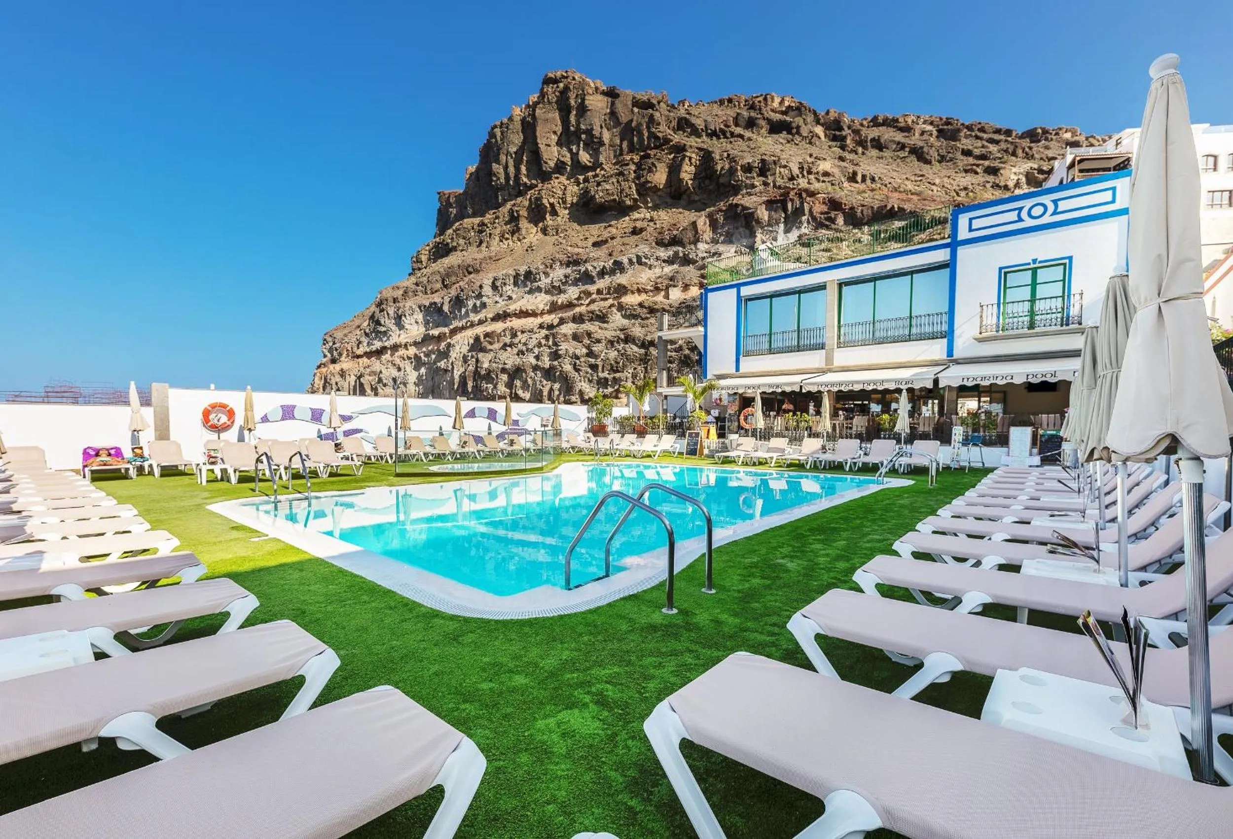 Swimming pool in Billy's Puerto de Mogán Apartments by LIVVO
