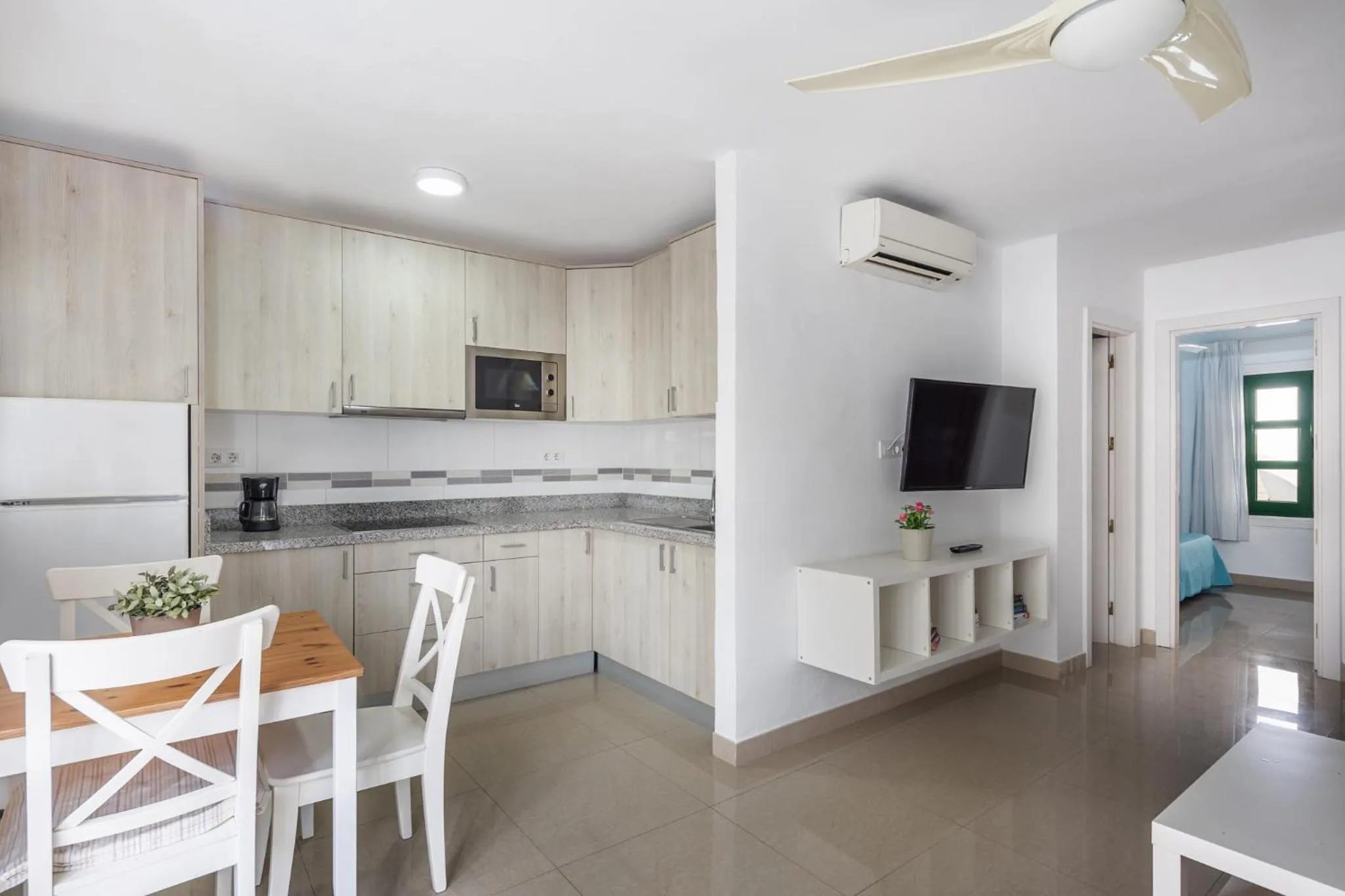 Kitchen or kitchenette in Billy's Puerto de Mogán Apartments by LIVVO