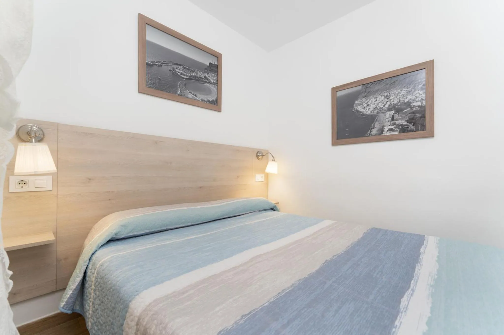 Bedroom, Bed in Billy's Puerto de Mogán Apartments by LIVVO