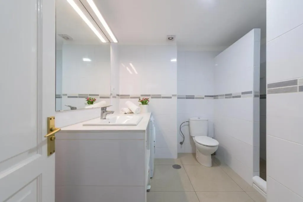 Bathroom in Billy's Puerto de Mogán Apartments by LIVVO