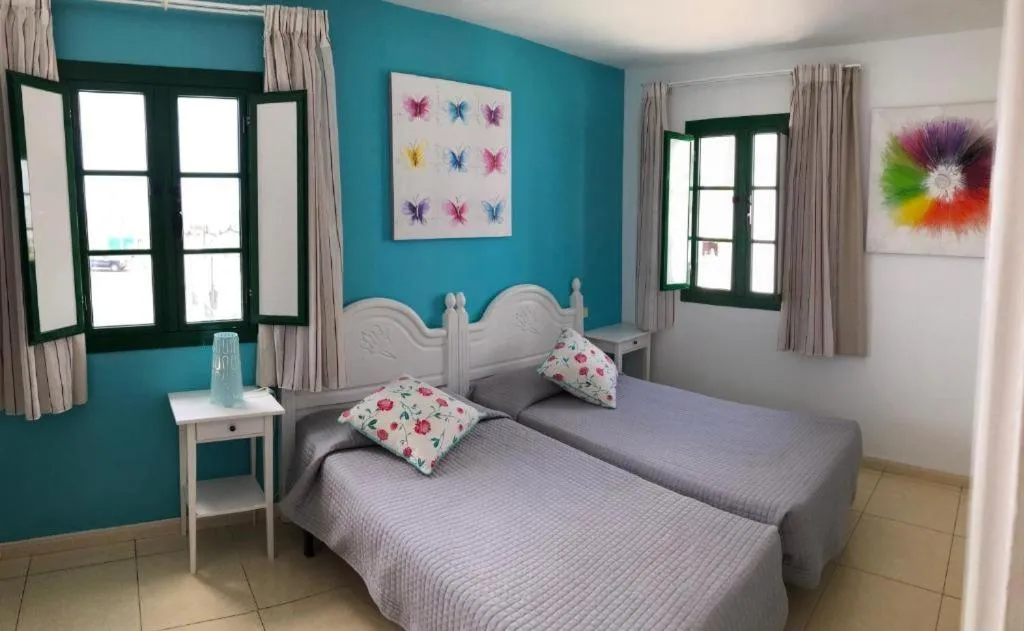 Bedroom, Bed in Billy's Puerto de Mogán Apartments by LIVVO