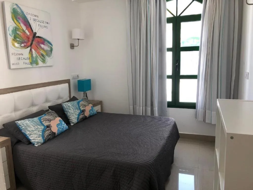 Bedroom, Bed in Billy's Puerto de Mogán Apartments by LIVVO