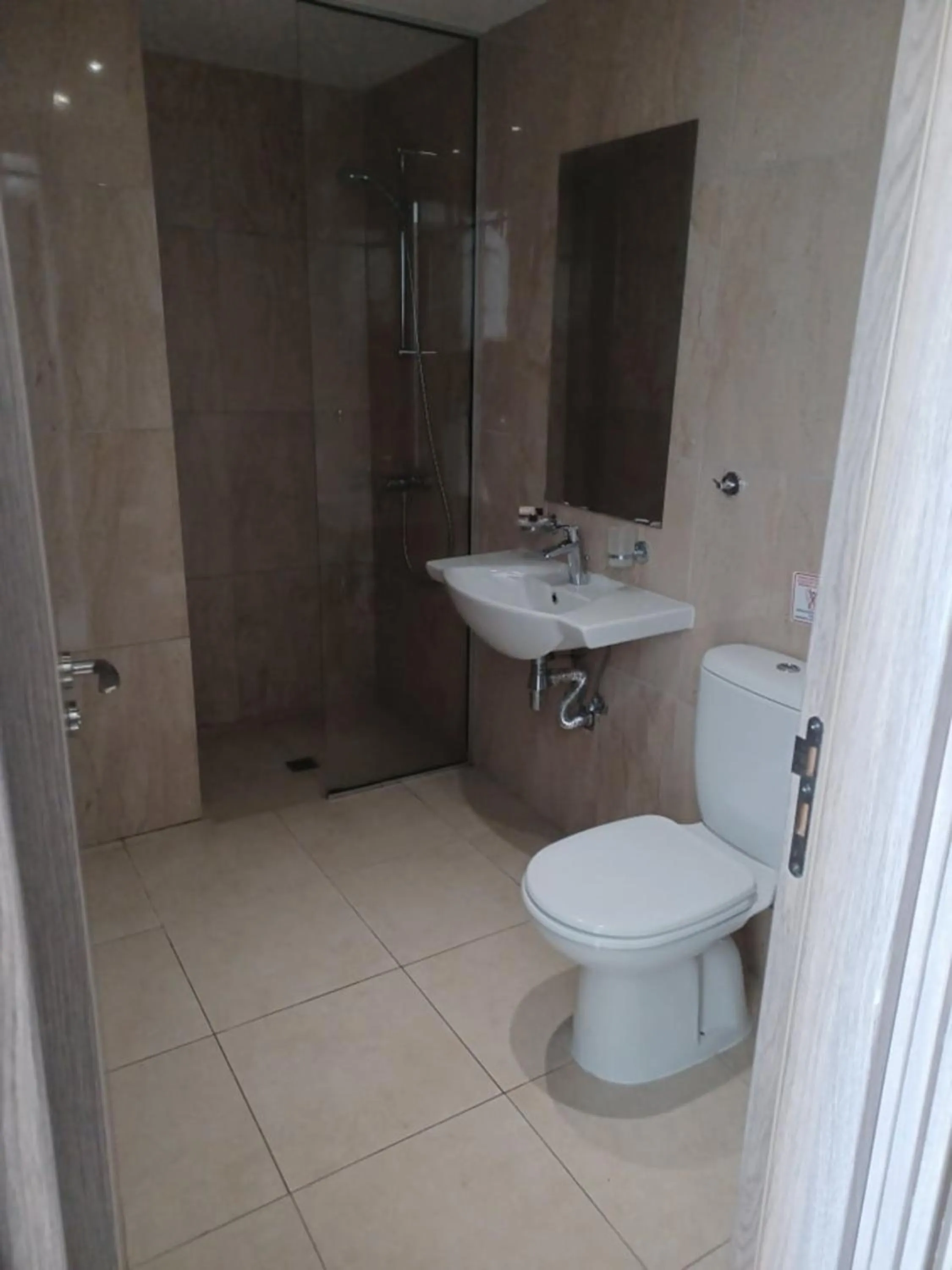 Shower in Sunny Blue Hotel