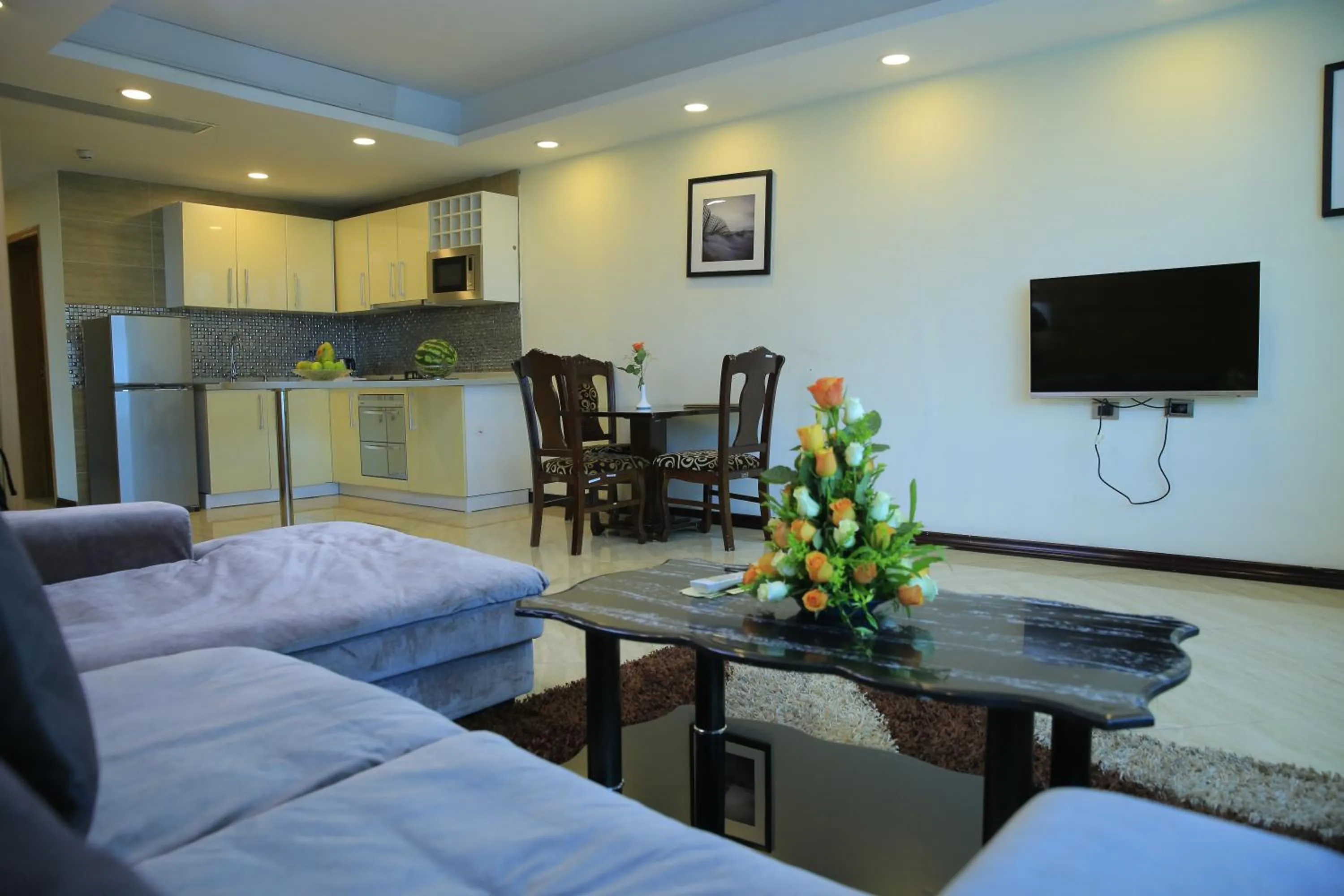 Communal lounge/ TV room in Inter Luxury Hotel