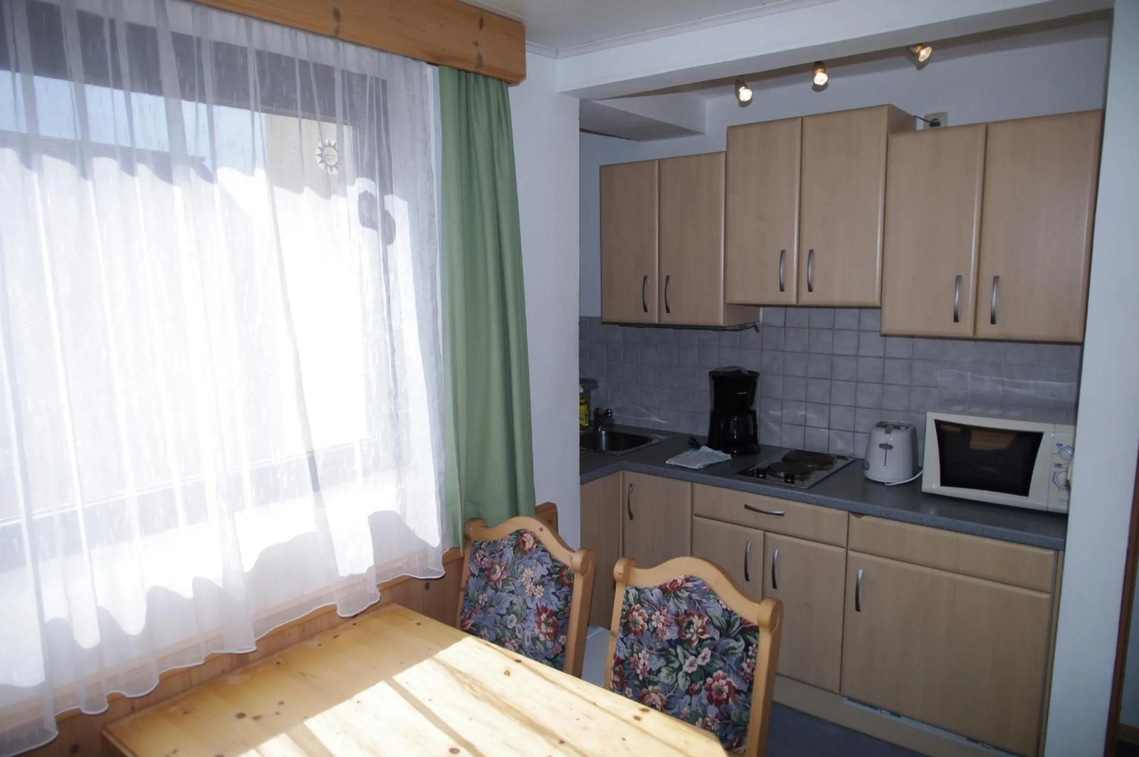 Kitchen or kitchenette in Apartment House Seerose self check-in