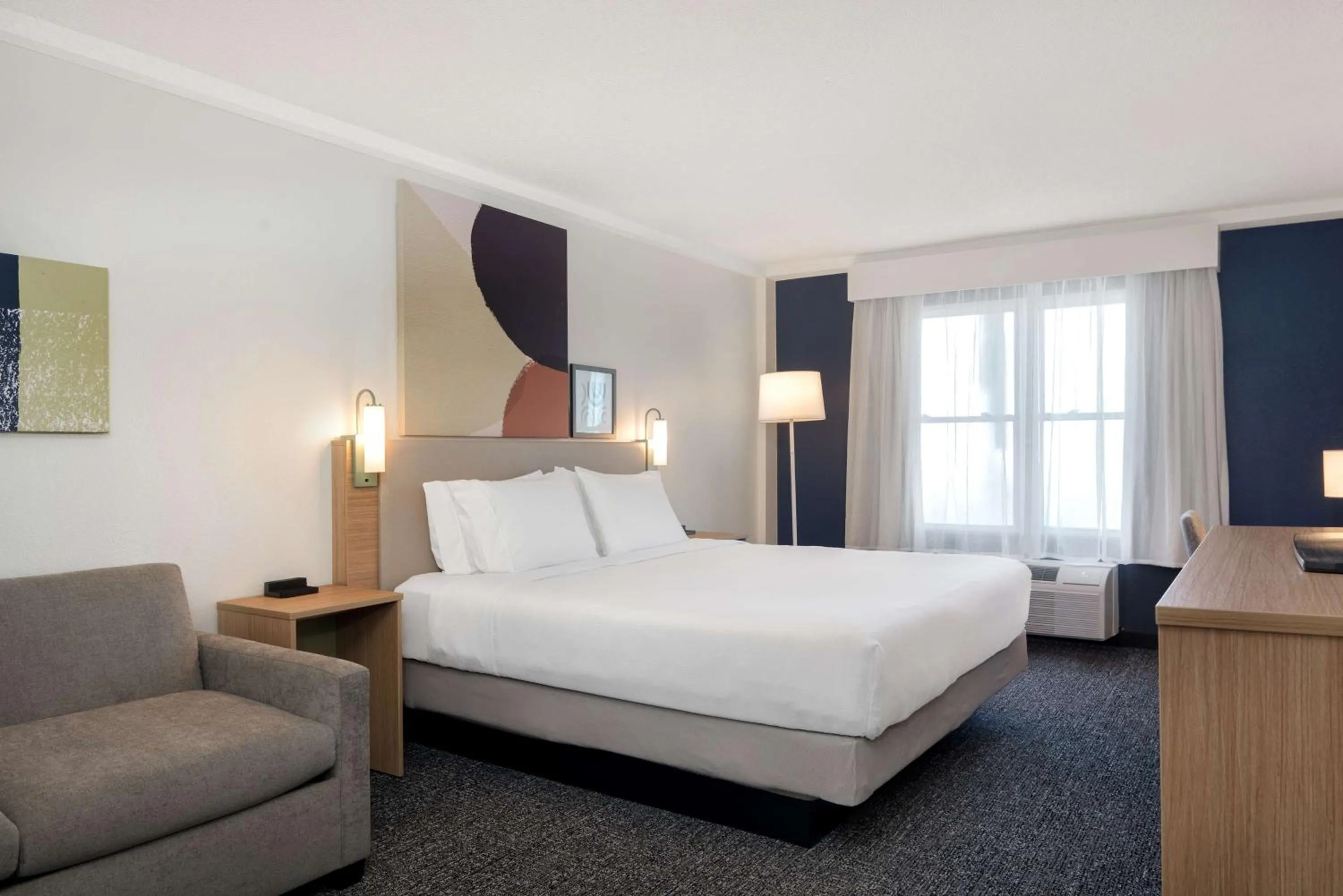 Living room, Bed in Spark By Hilton Orangeburg