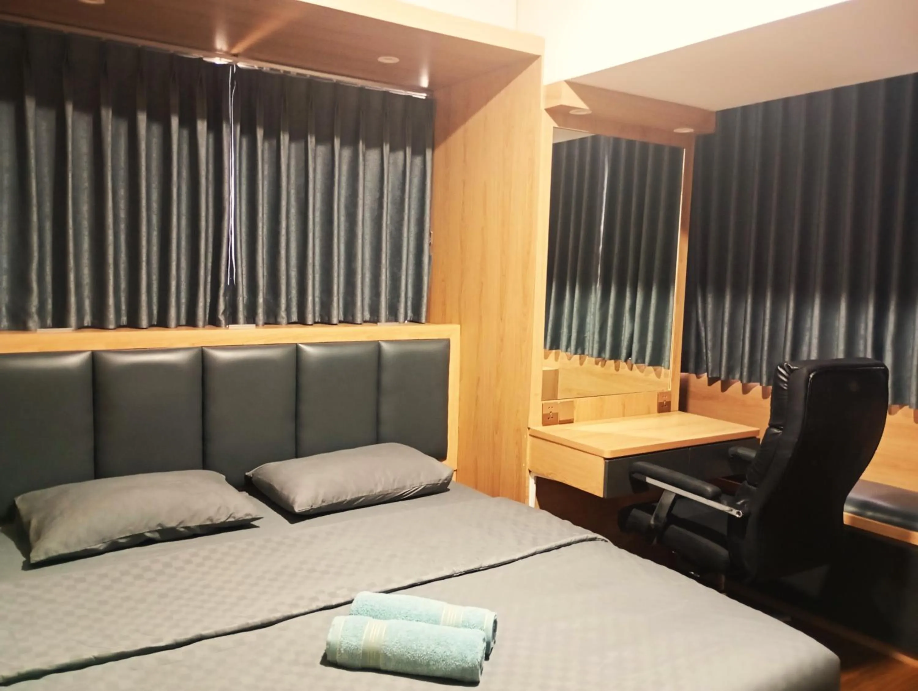 Seating area, Bed in SleepRest @ Pollux Habibie