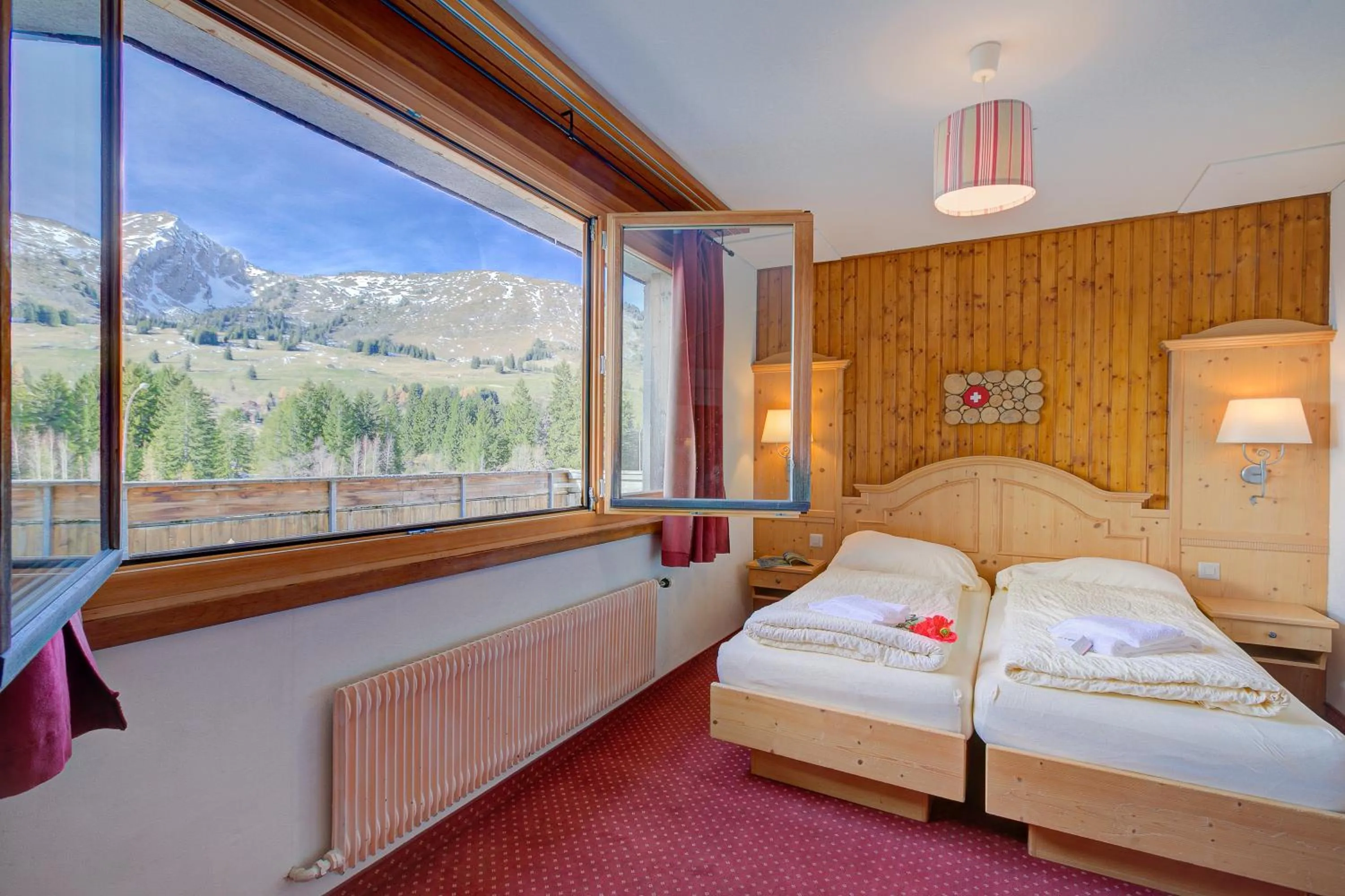 Bed in Hotel Relais Alpin