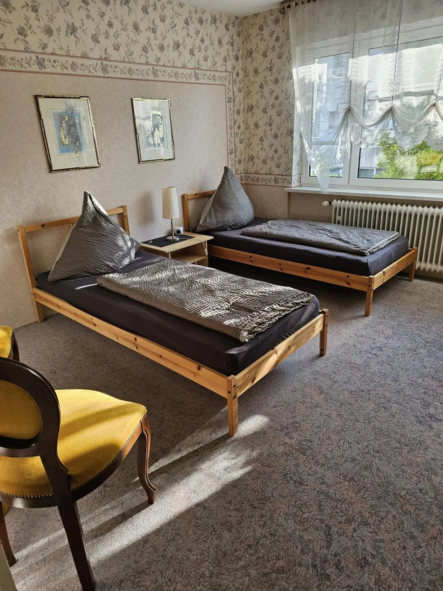 Bed in Gästehaus3land in Weil am Rhein