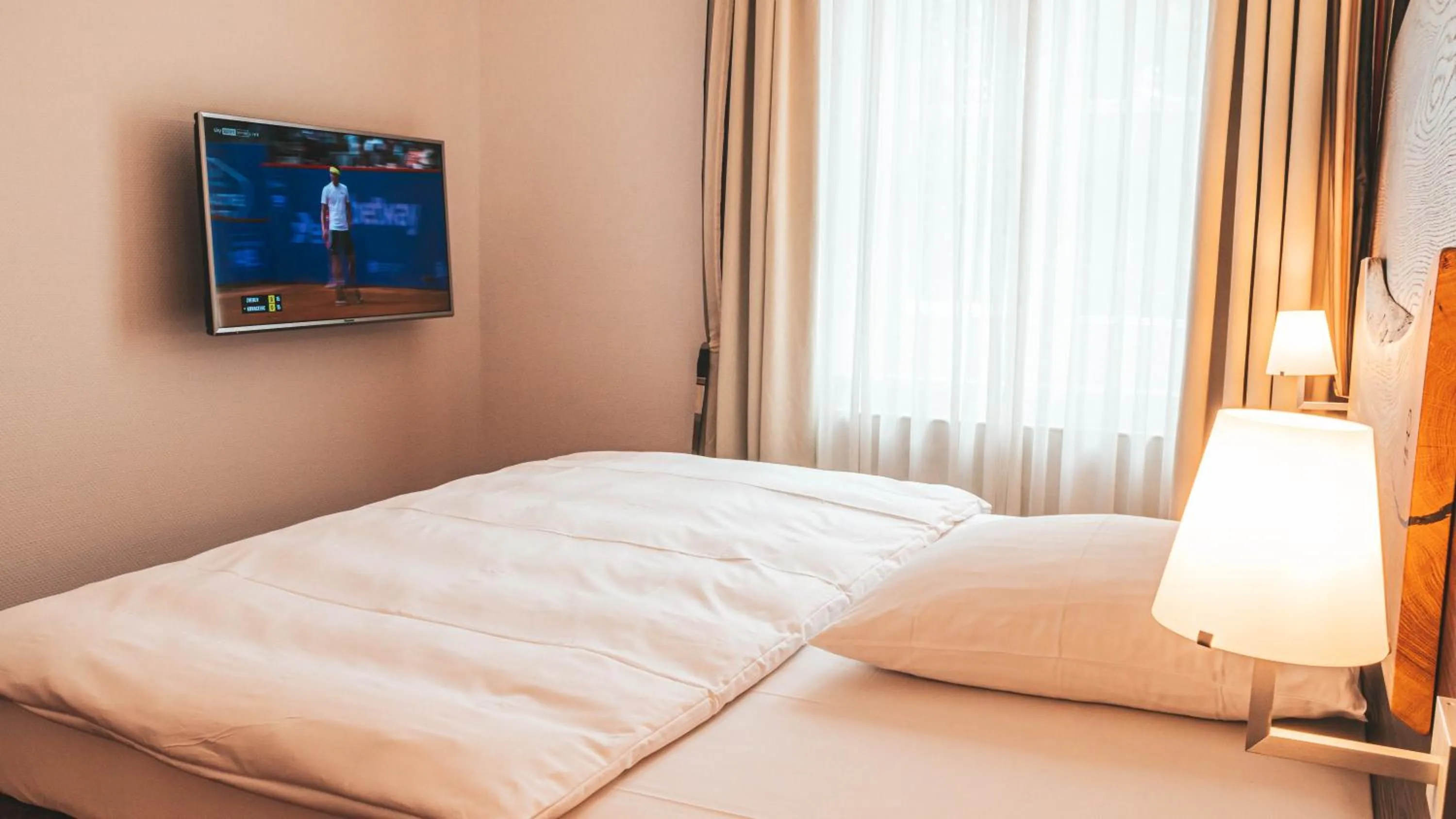 Bed in Parkhotel Wolfsburg