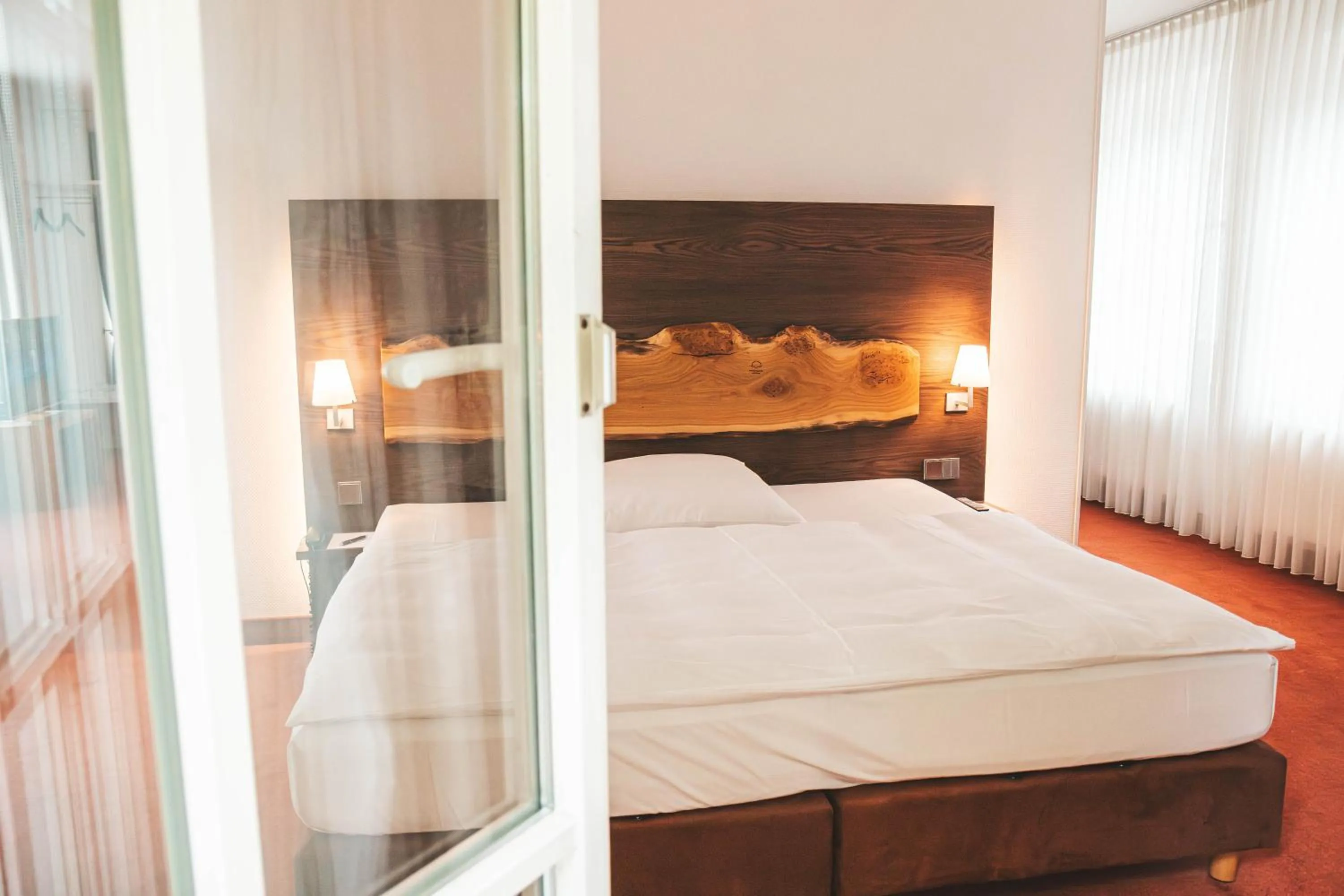 Bed in Parkhotel Wolfsburg