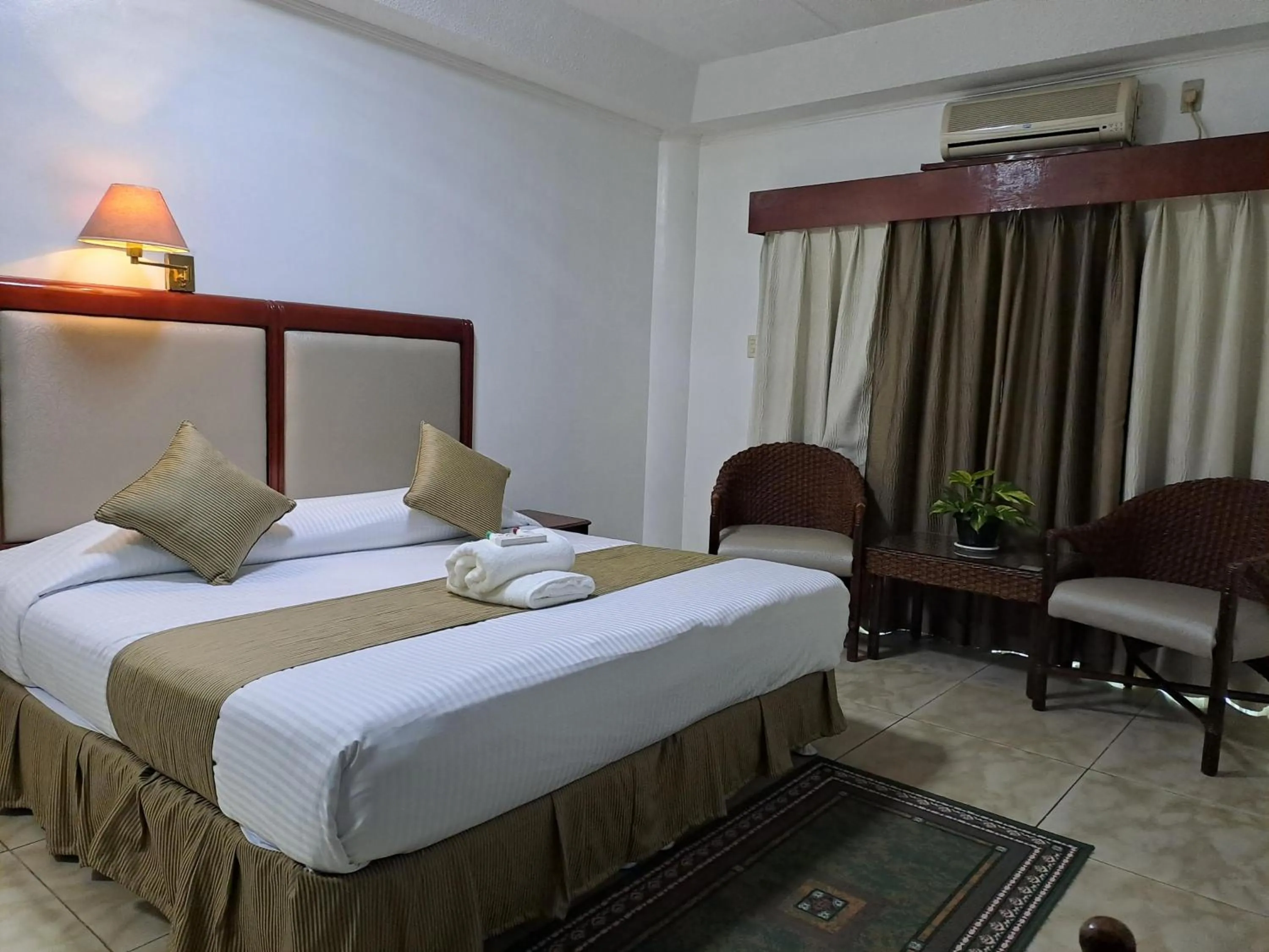 Bedroom, Bed in Wild Orchid Resort