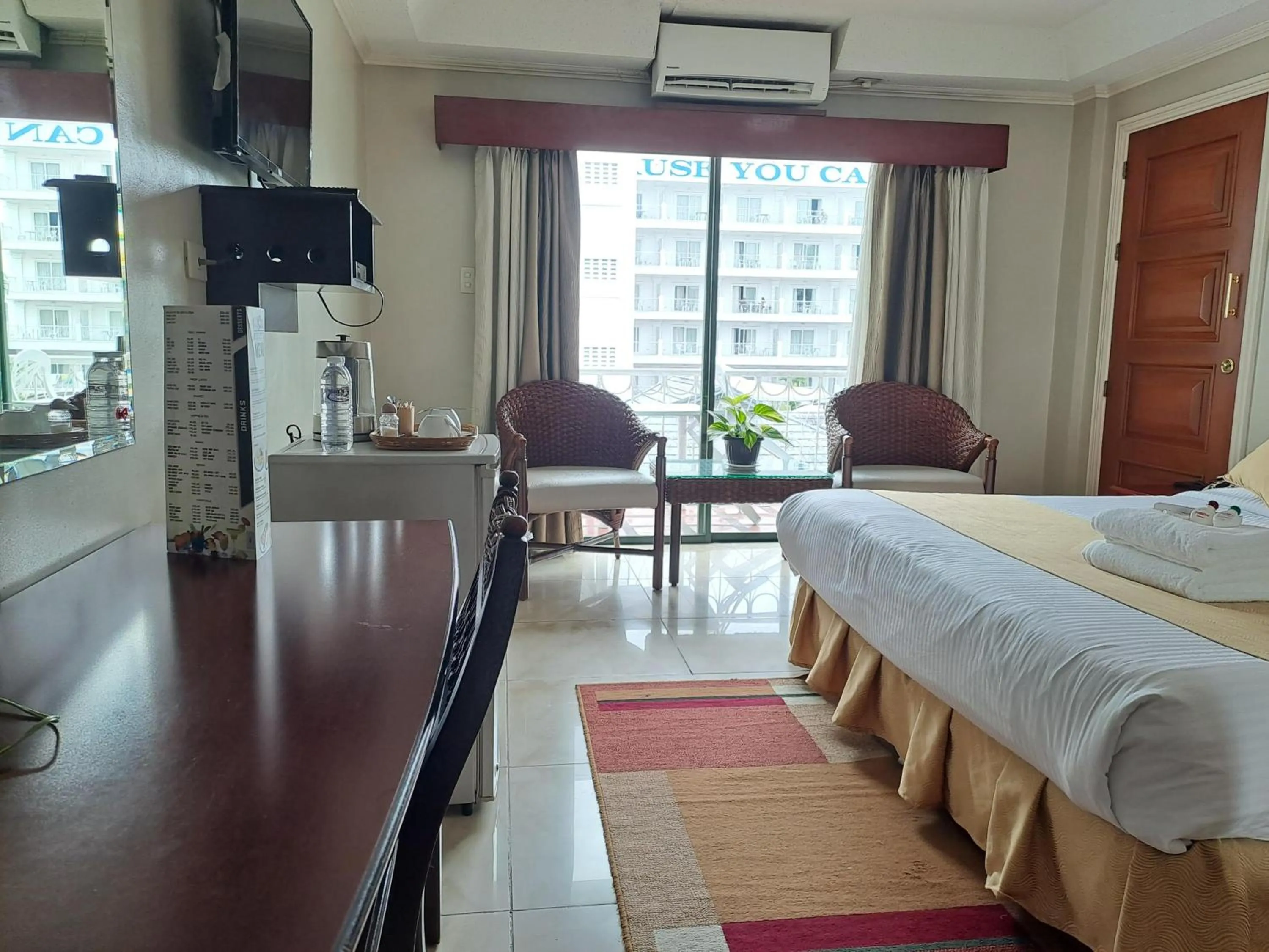 Bed in Wild Orchid Resort