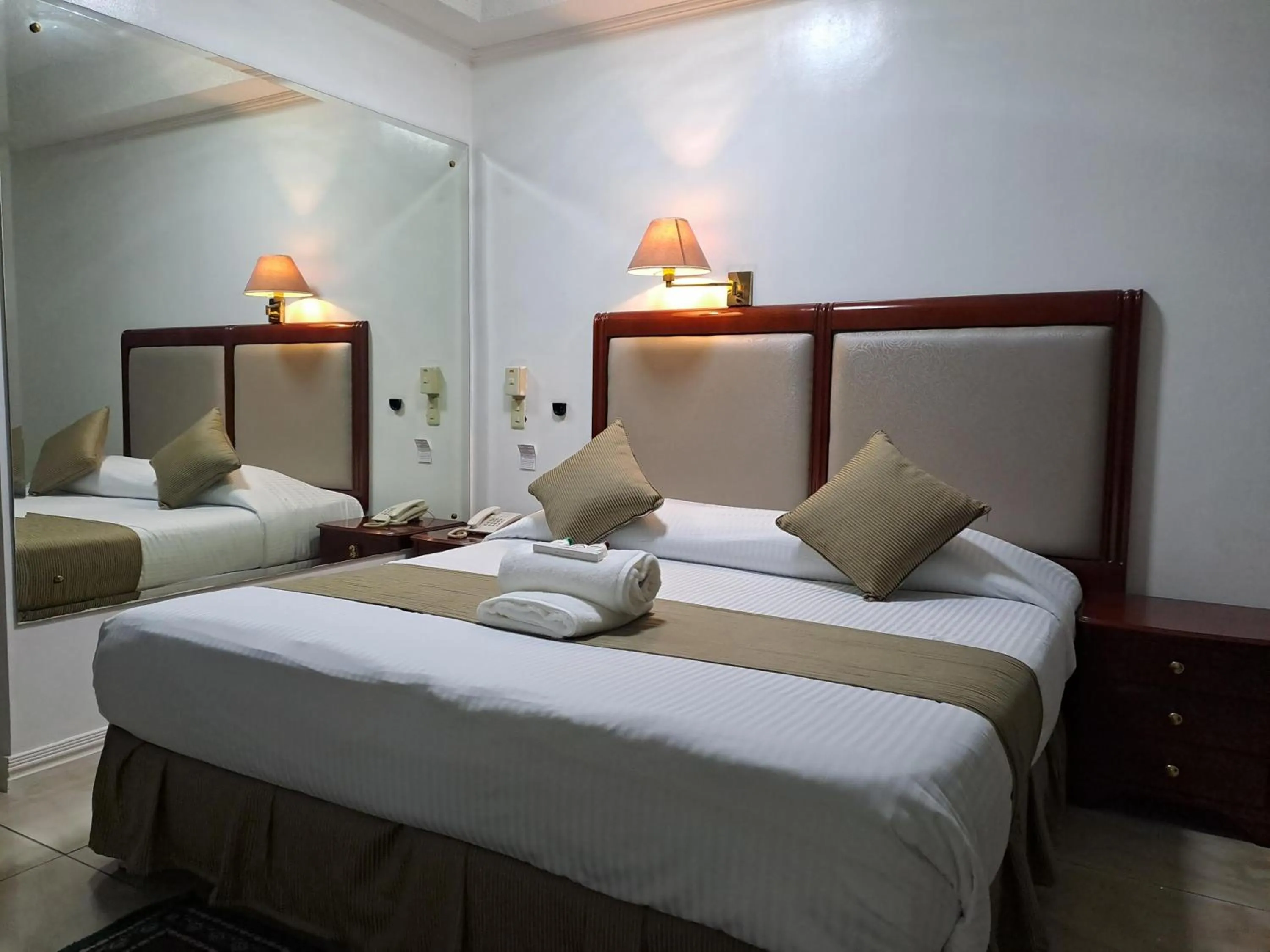 Photo of the whole room, Bed in Wild Orchid Resort