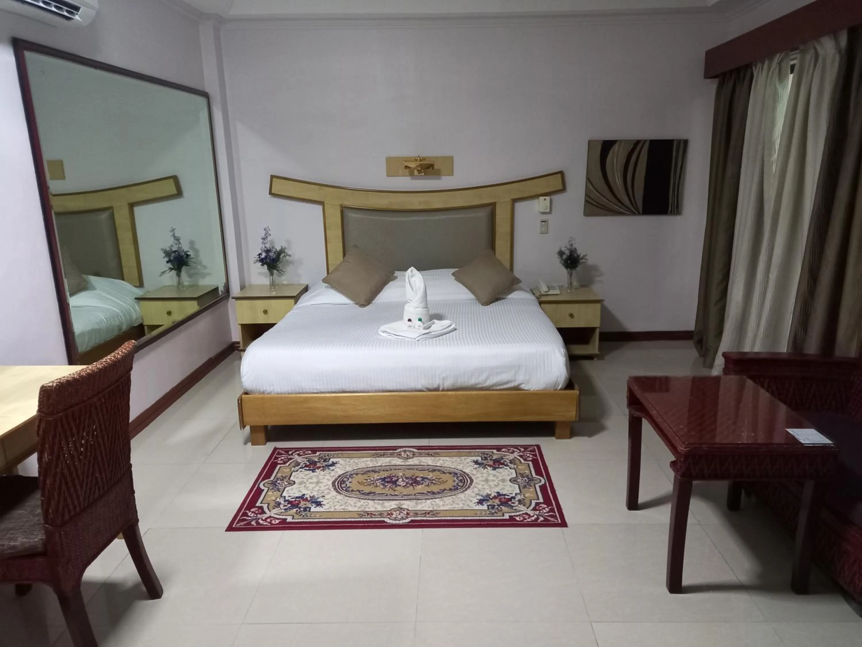 Bedroom, Bed in Wild Orchid Resort