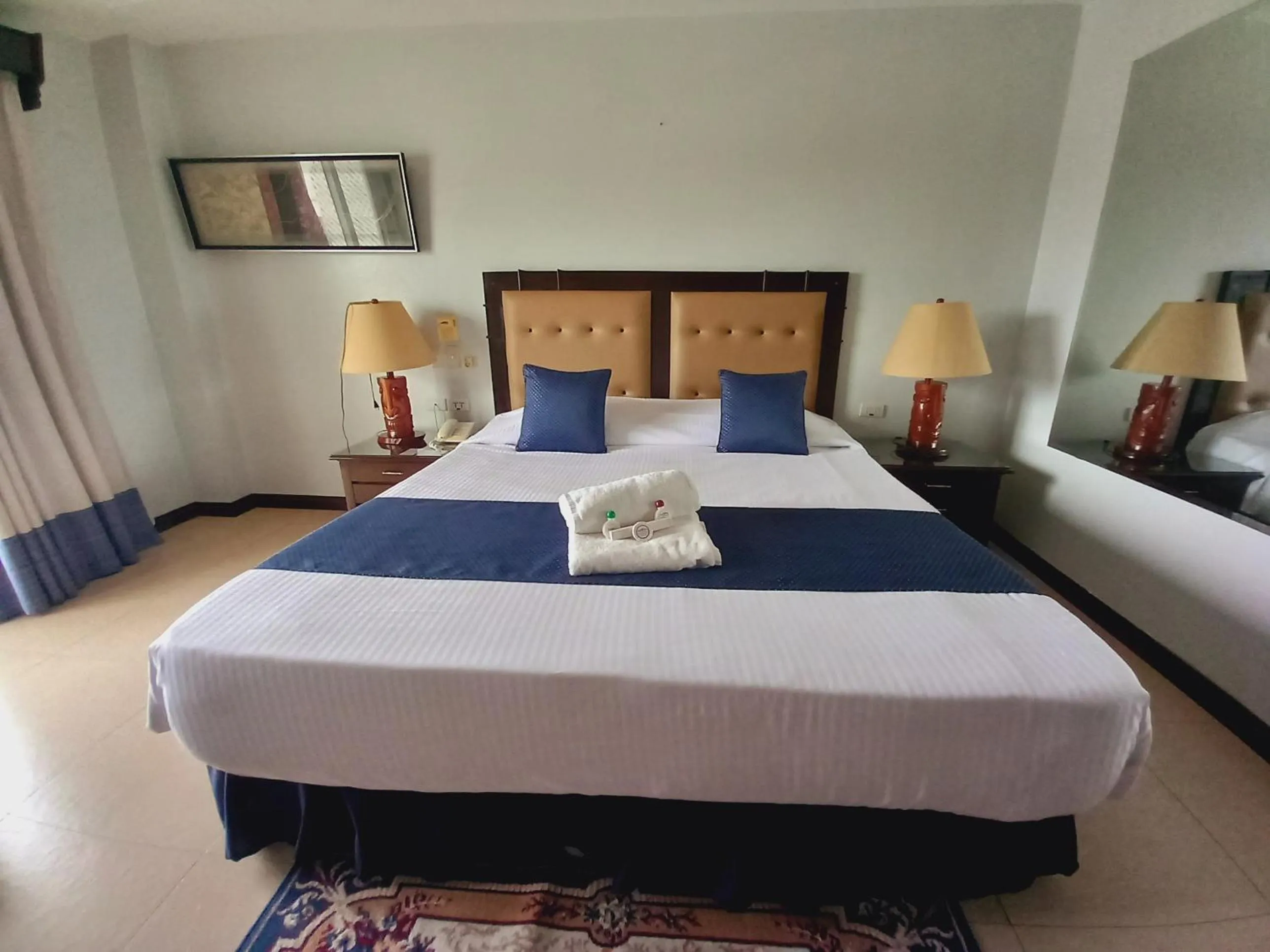 Bedroom, Bed in Wild Orchid Resort