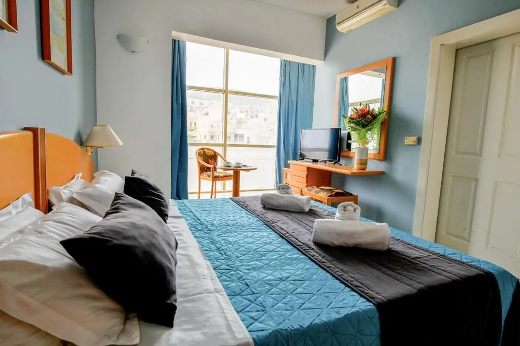 Bed in La Playa Hotel