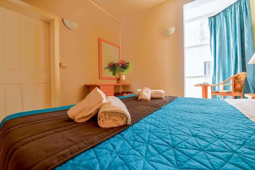 Bed in La Playa Hotel