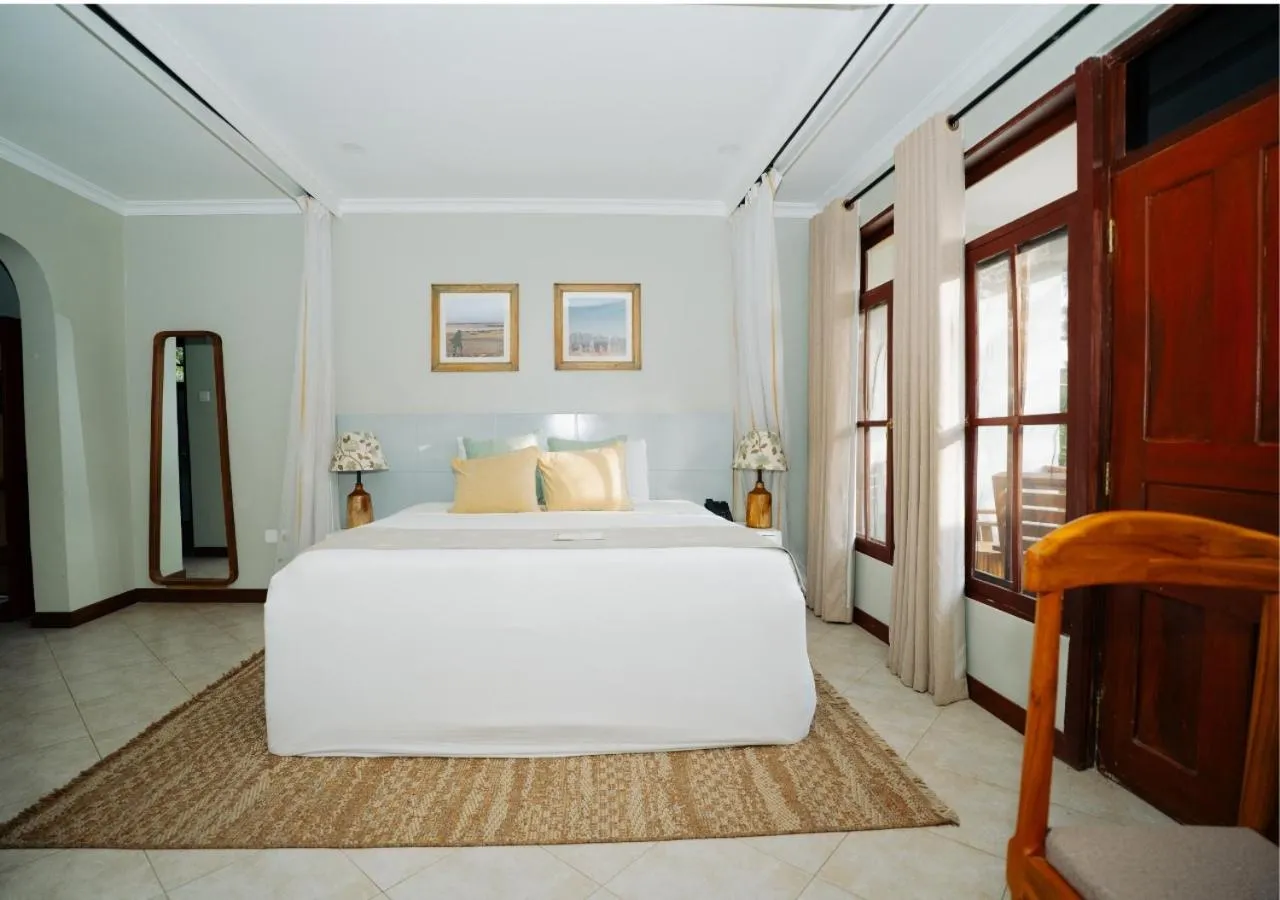 Bed in Arusha Planet Lodge