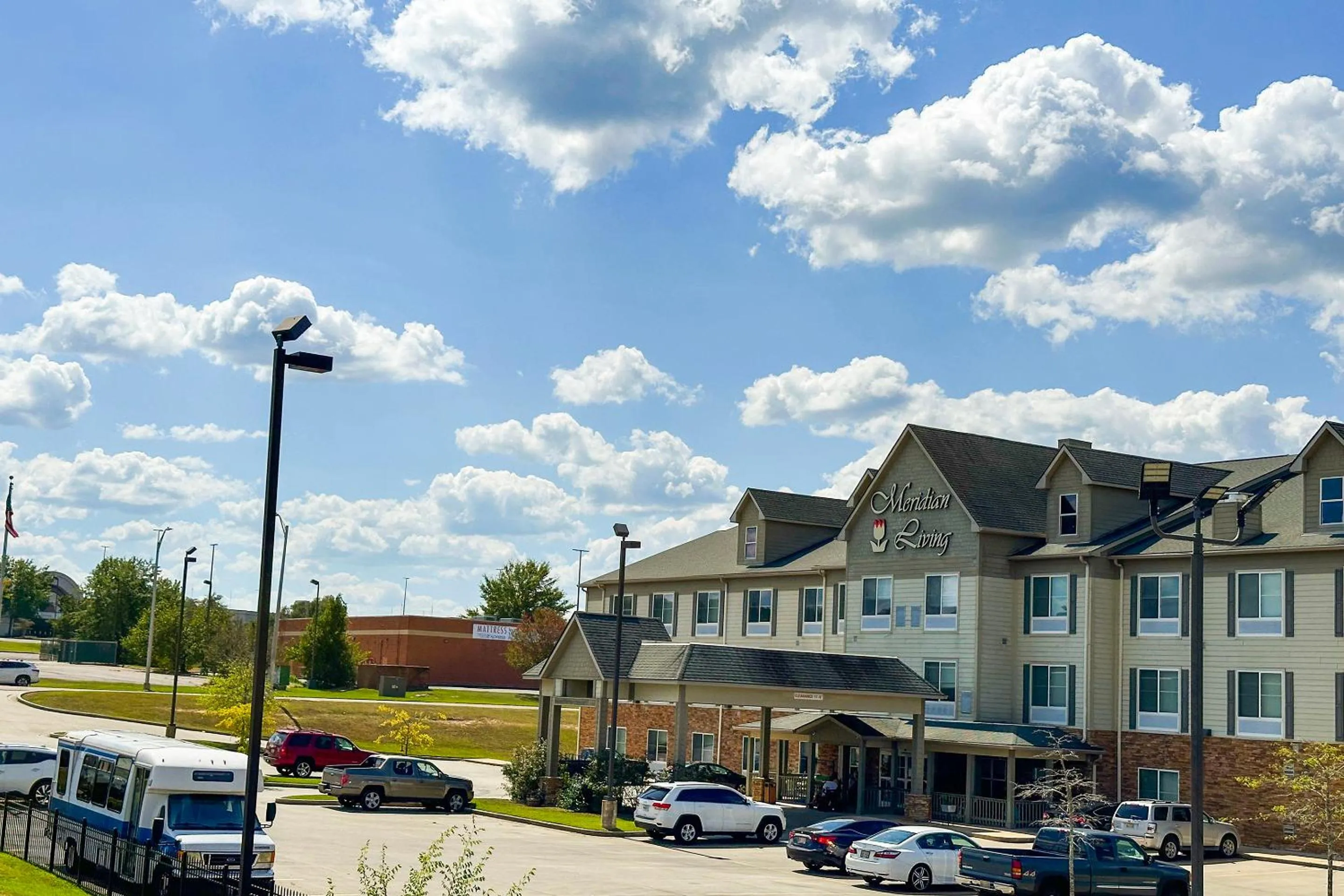 Property building in Bonita Lakes Inn by Capital O Meridian I20