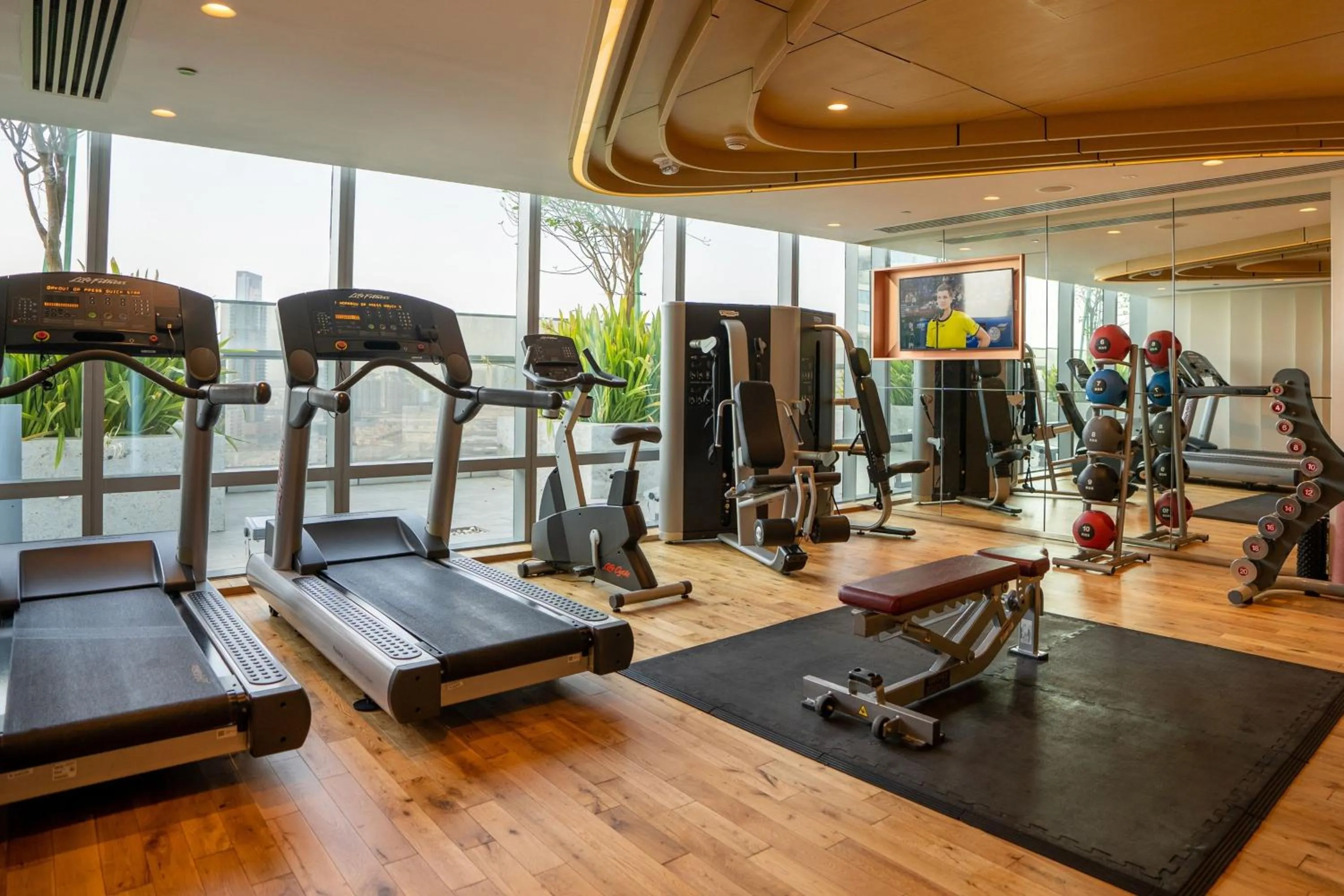 Fitness centre/facilities in The First Collection Dubai Jumeirah Village Circle, a Tribute Portfolio Hotel