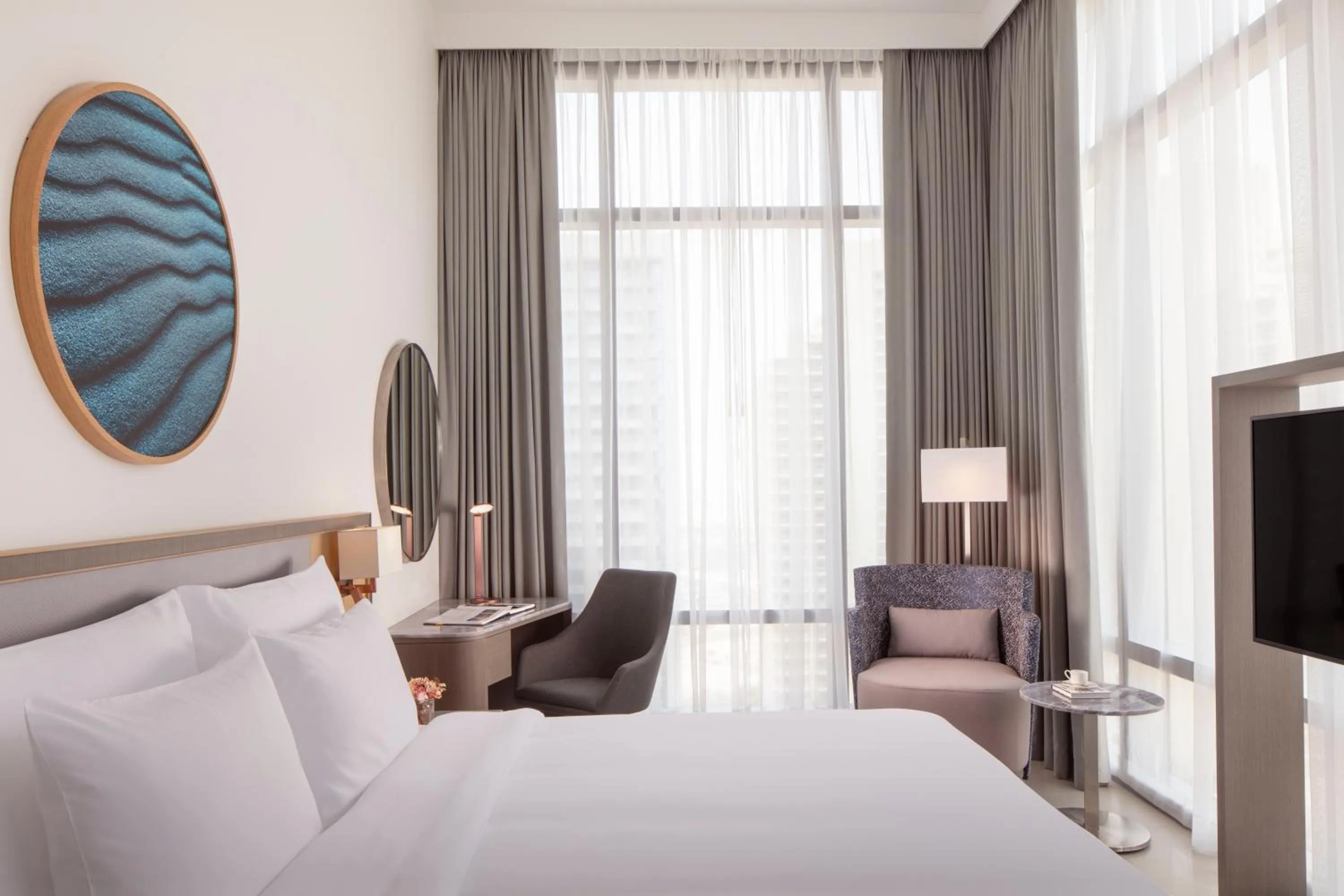 Photo of the whole room, Bed in The First Collection Dubai Jumeirah Village Circle, a Tribute Portfolio Hotel
