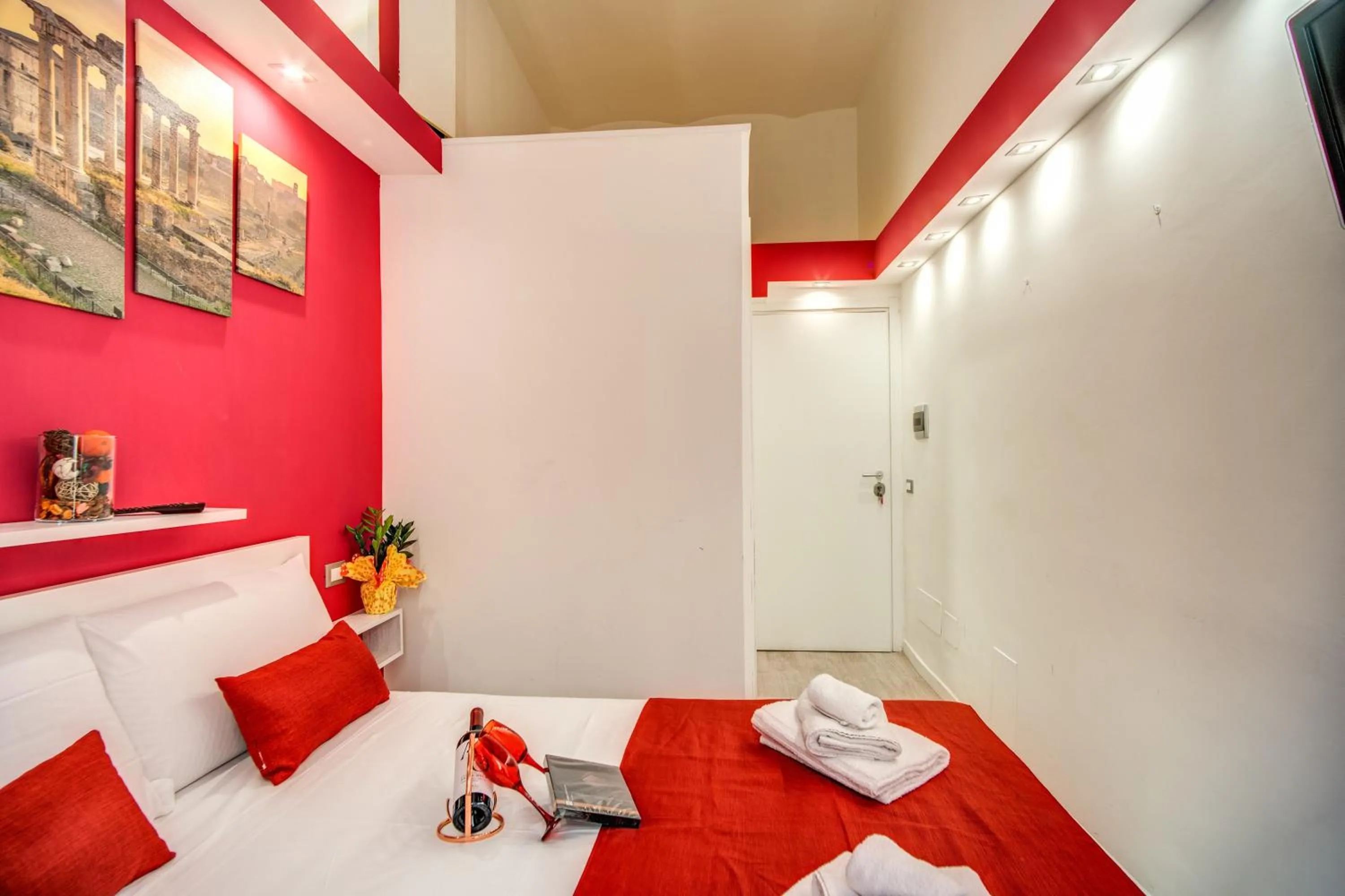 Bed in ROYAL VATICAN SUITES