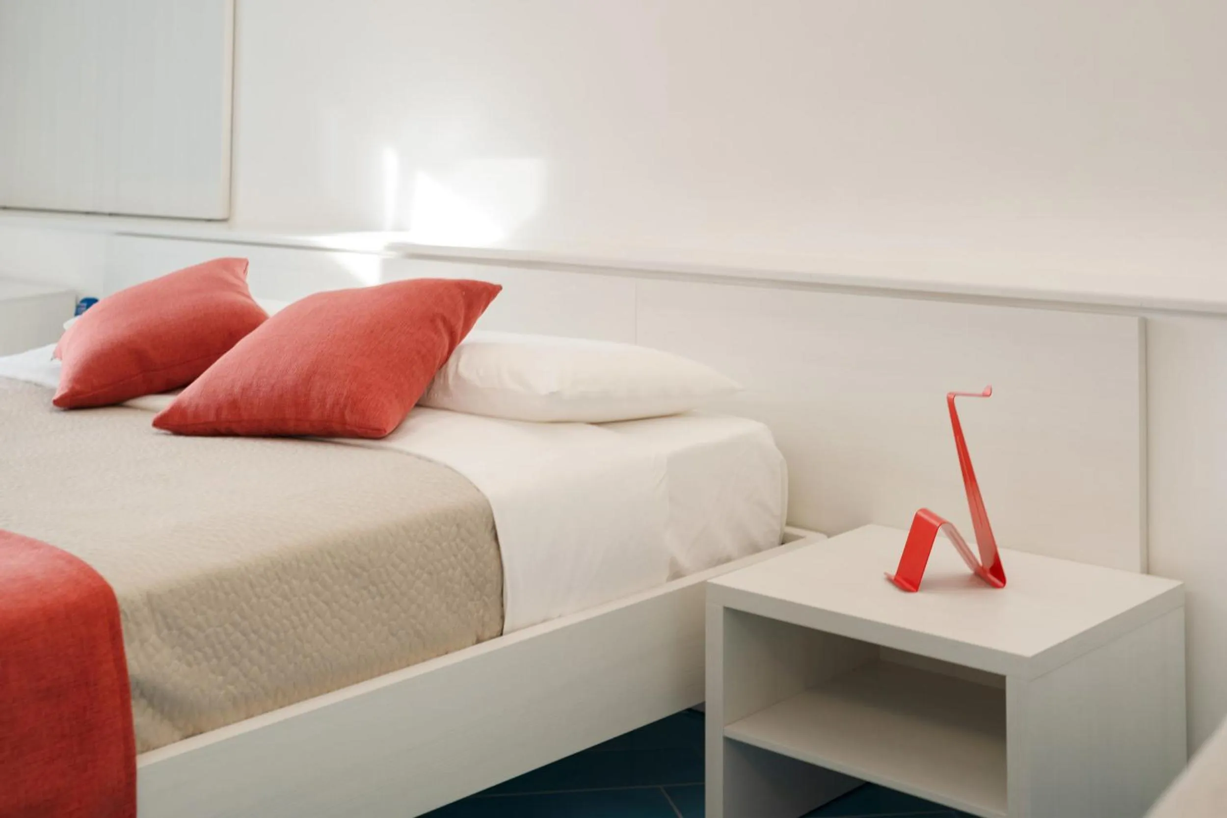 Bed in Il Corallo Residence