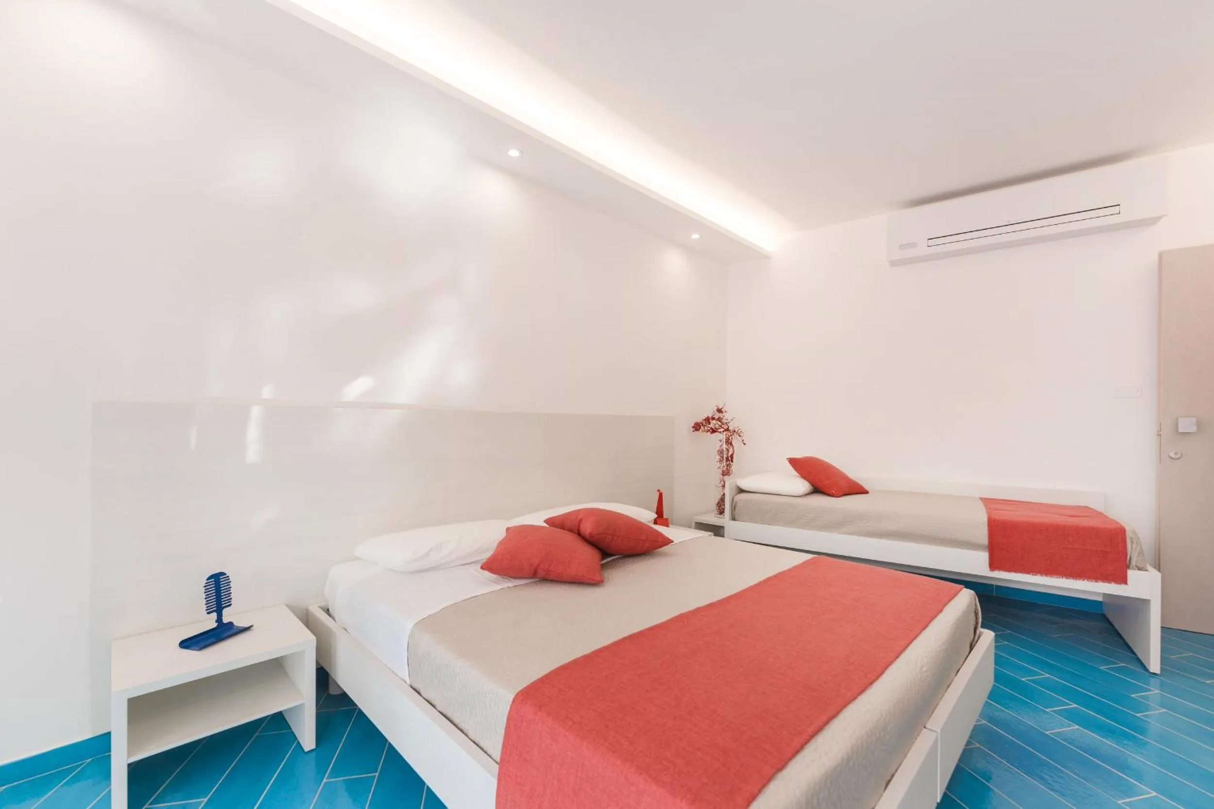 Bed in Il Corallo Residence