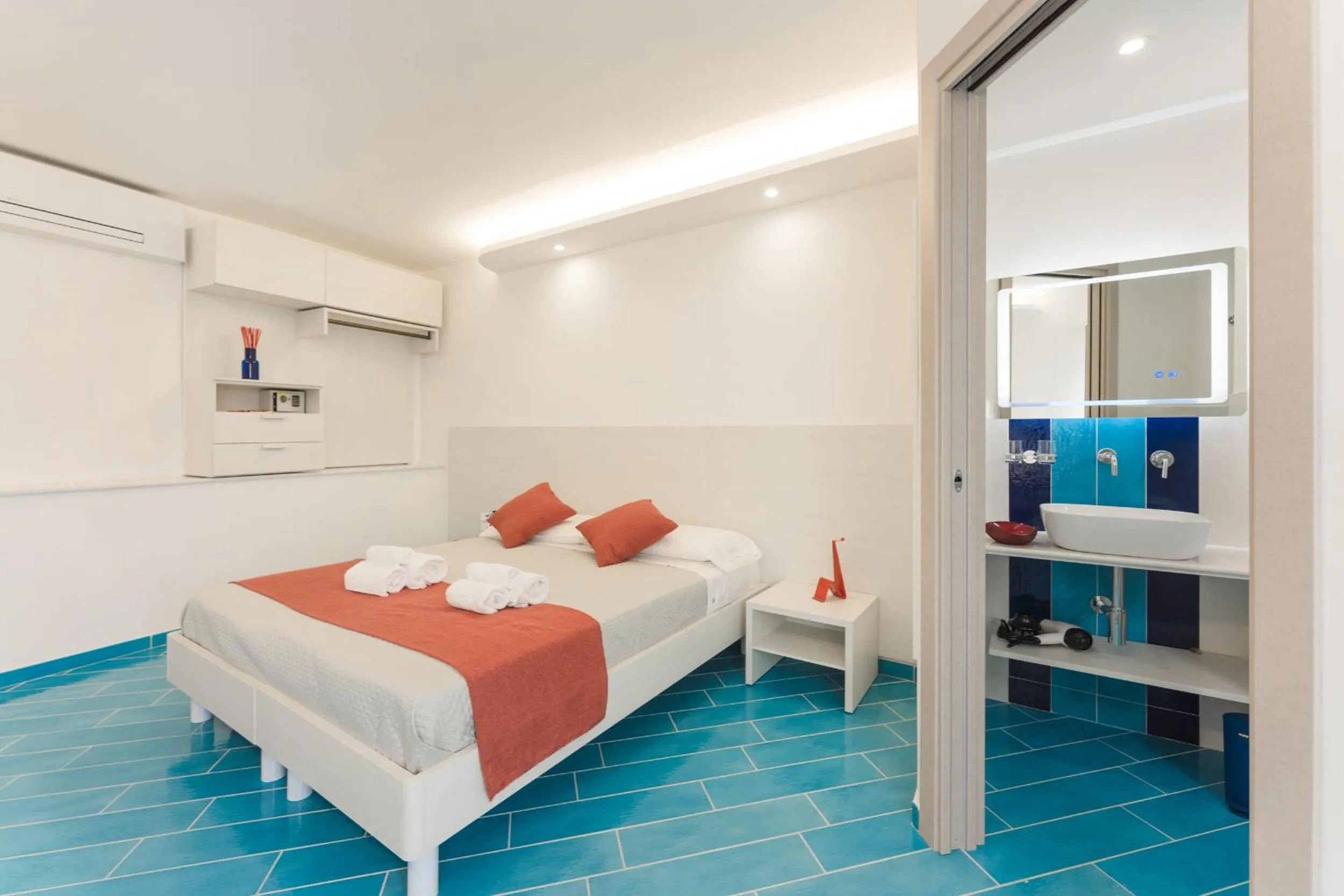 Bed in Il Corallo Residence