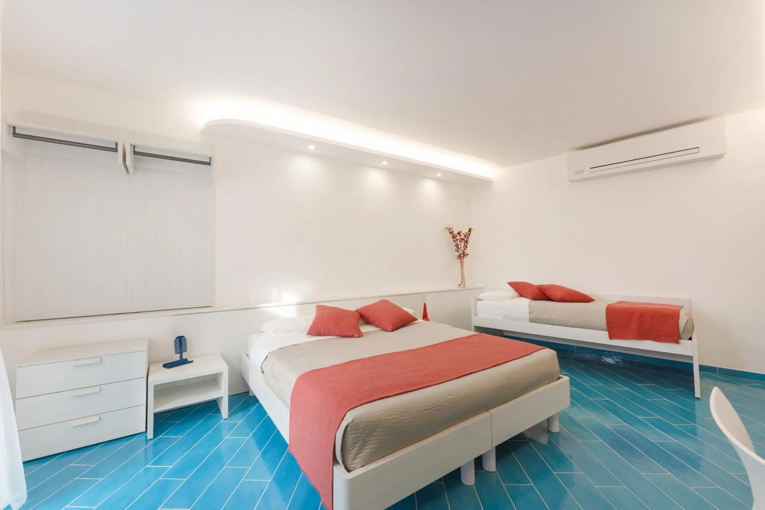 Bed in Il Corallo Residence