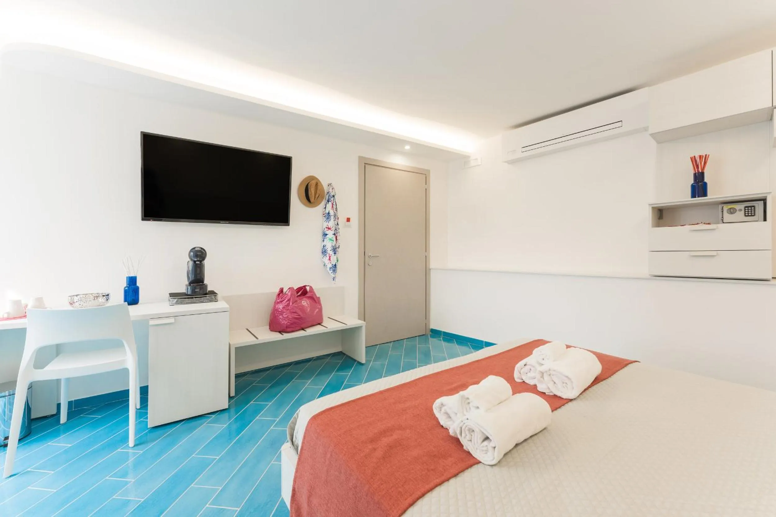 Bed in Il Corallo Residence