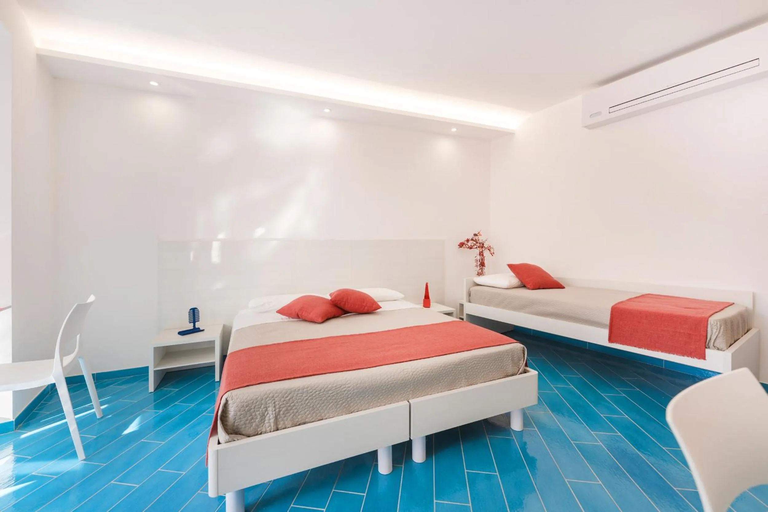 Bed in Il Corallo Residence