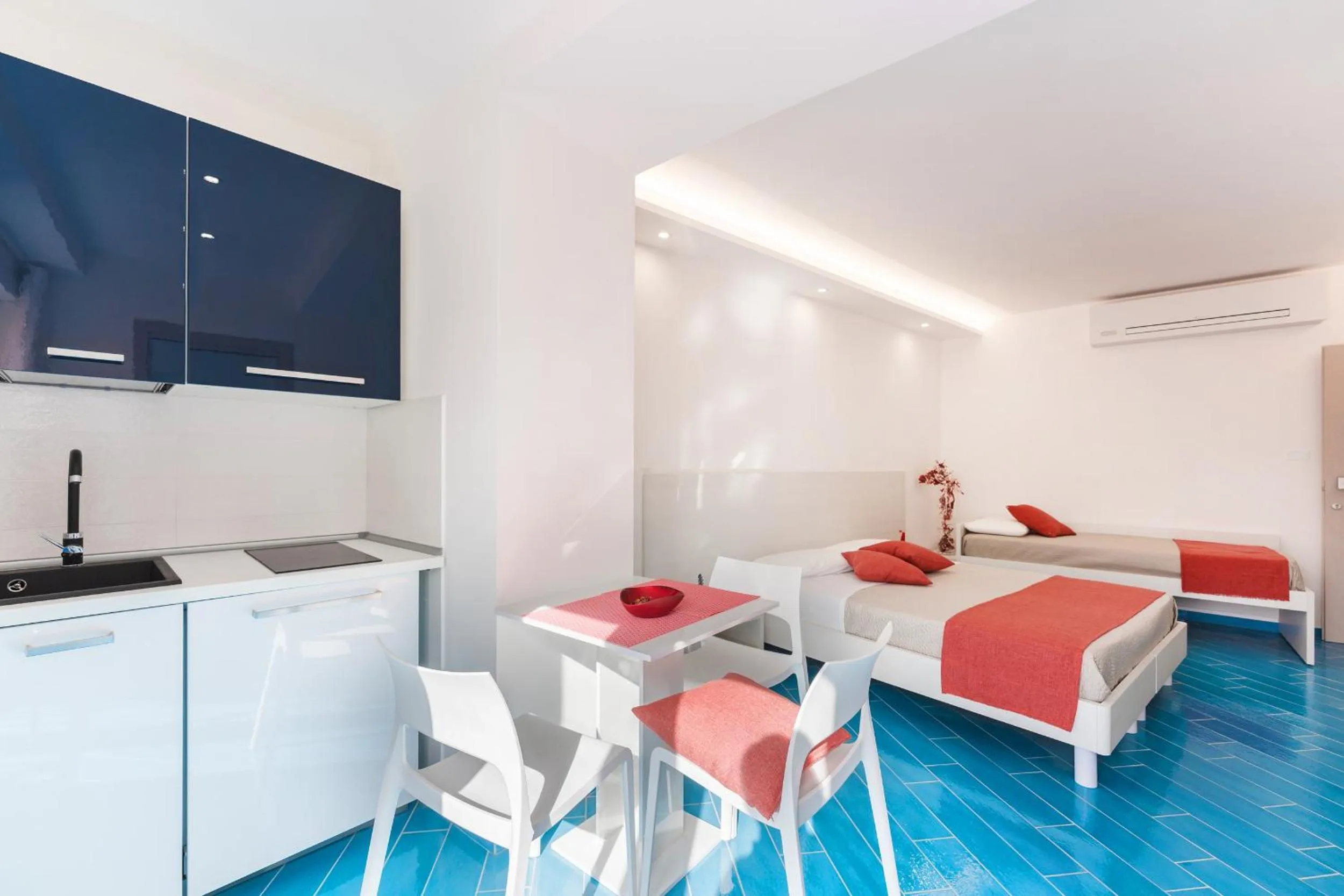 Bed in Il Corallo Residence