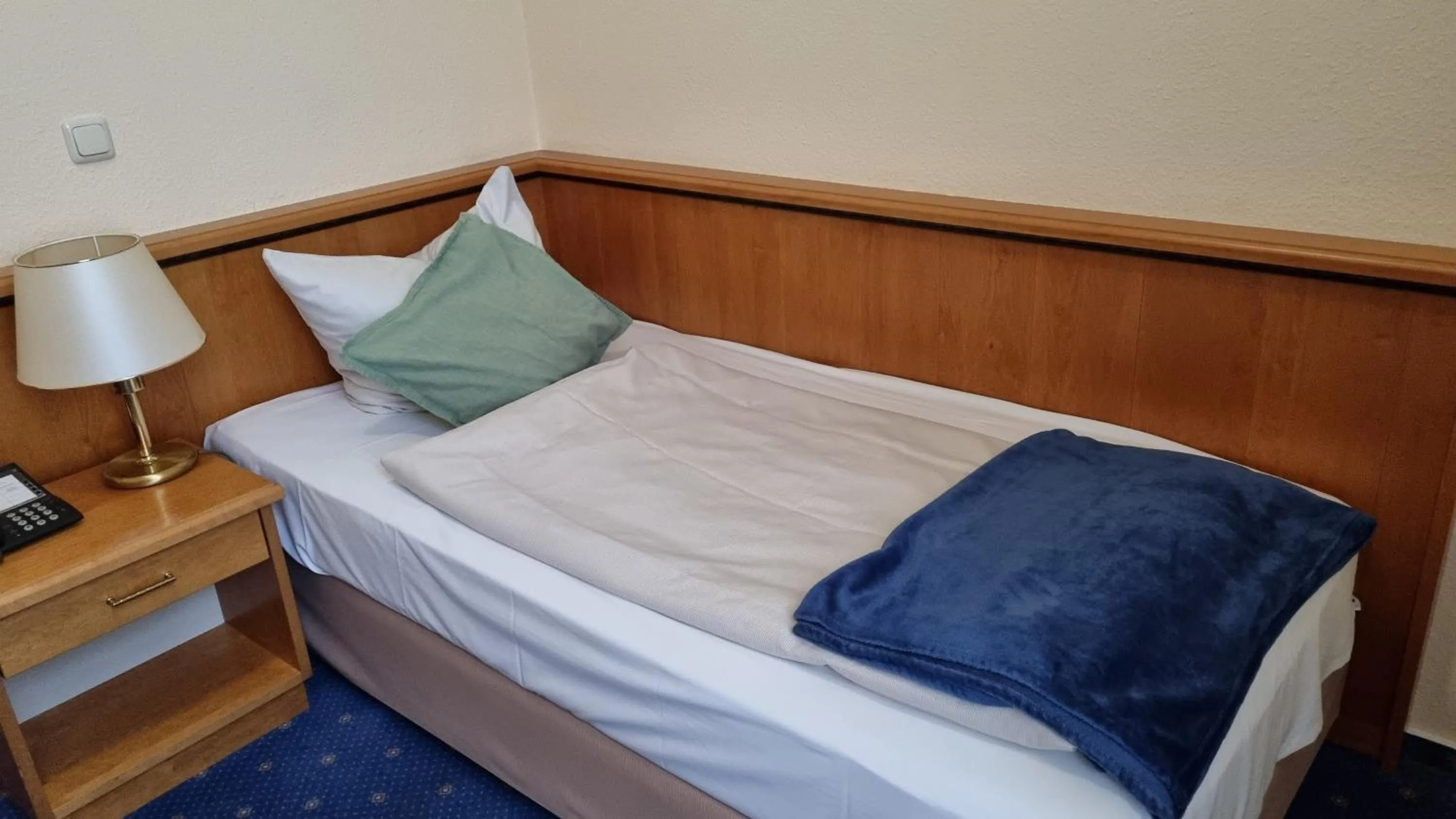 Bed in Residenzia Hotel Grenadier