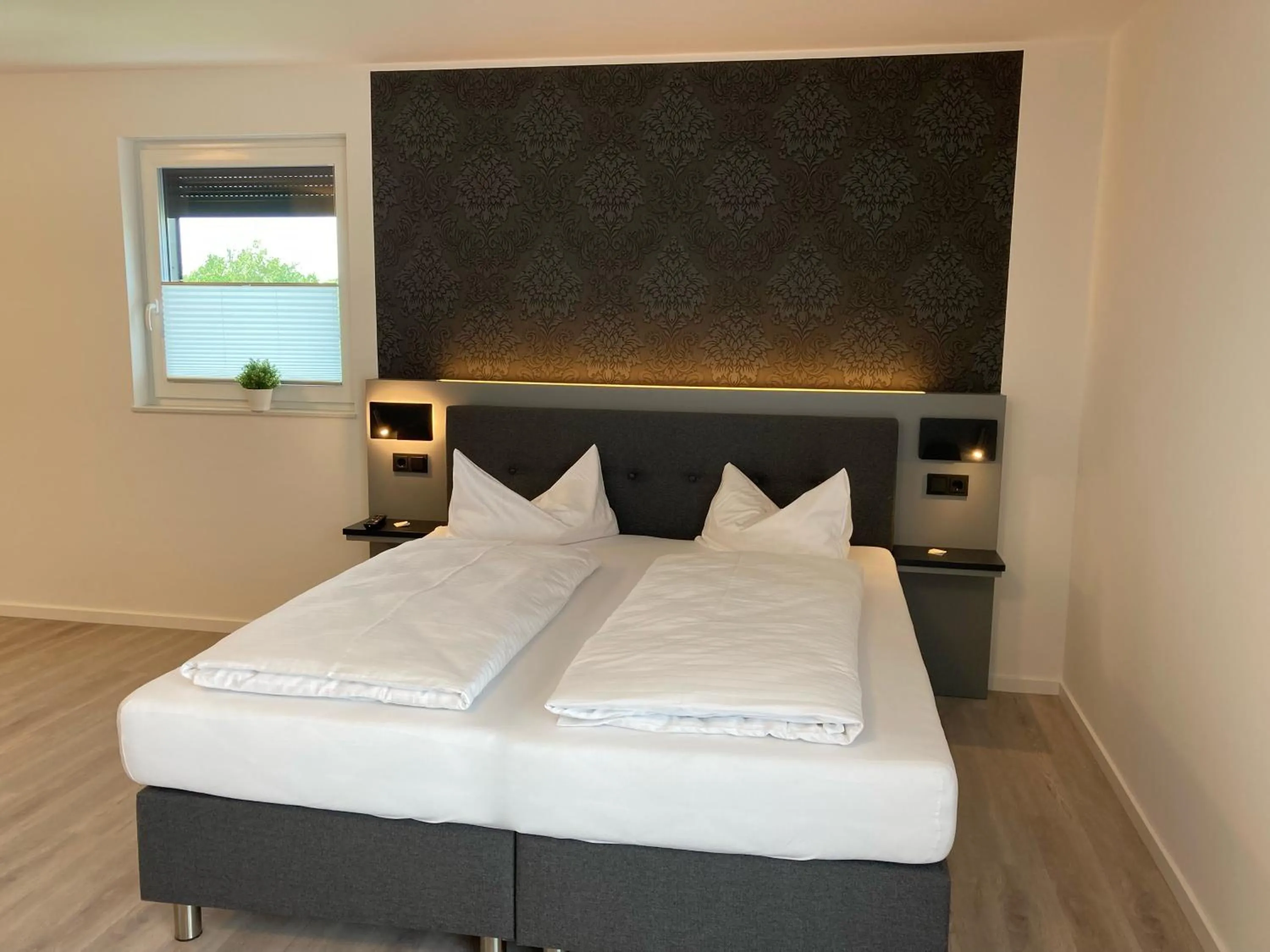 Photo of the whole room, Bed in CAP1 Boardinghouse